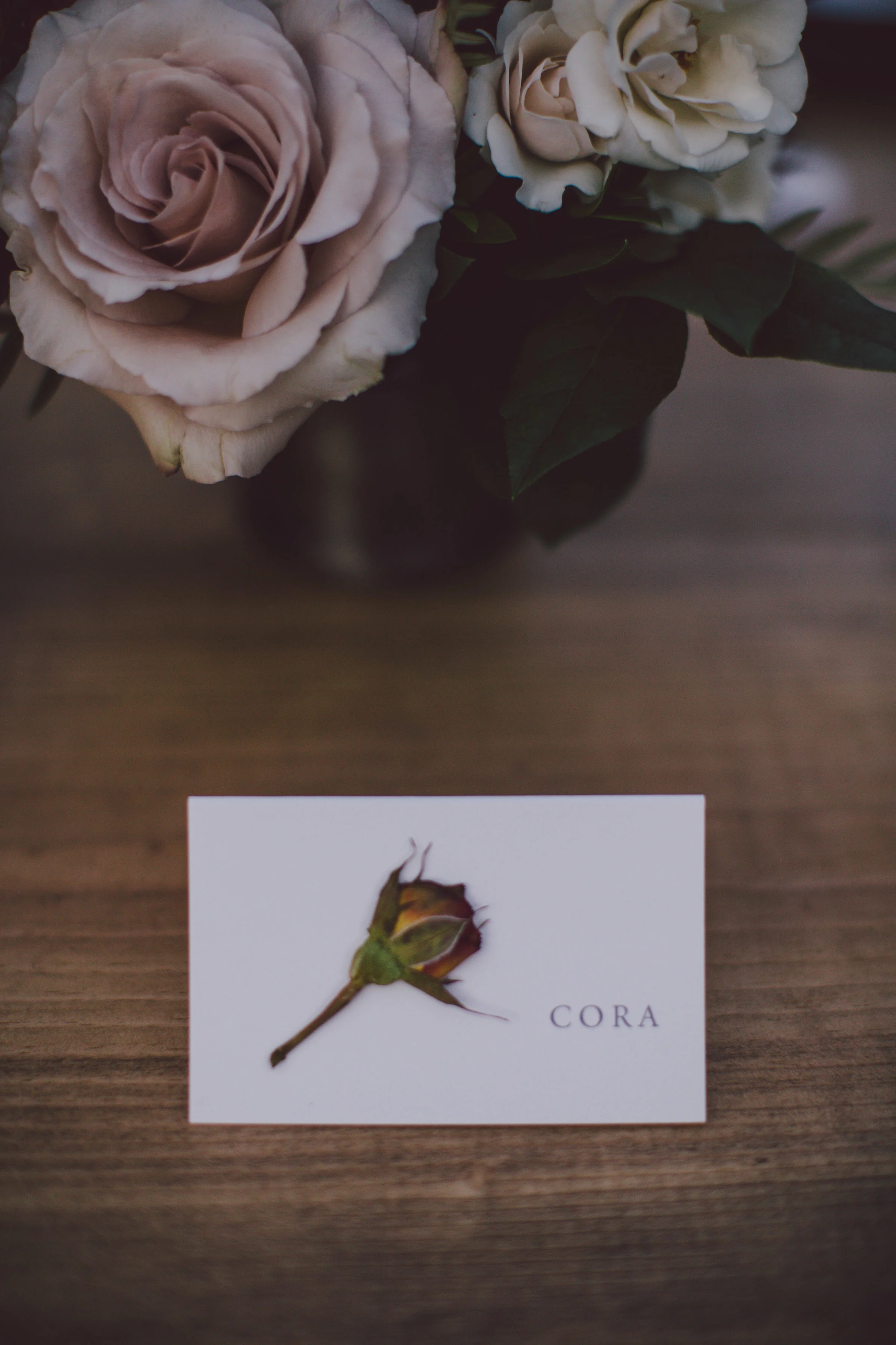 Pressed flower wedding escort name cards