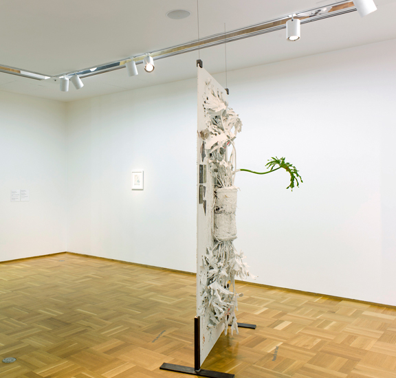  Pressed Plant (Hanging Gardens), 2012, Banana palm, latex paint, spray paint, glass, resin, mirror, glass, bone, porcelain, 92 x 45 inches&nbsp; 