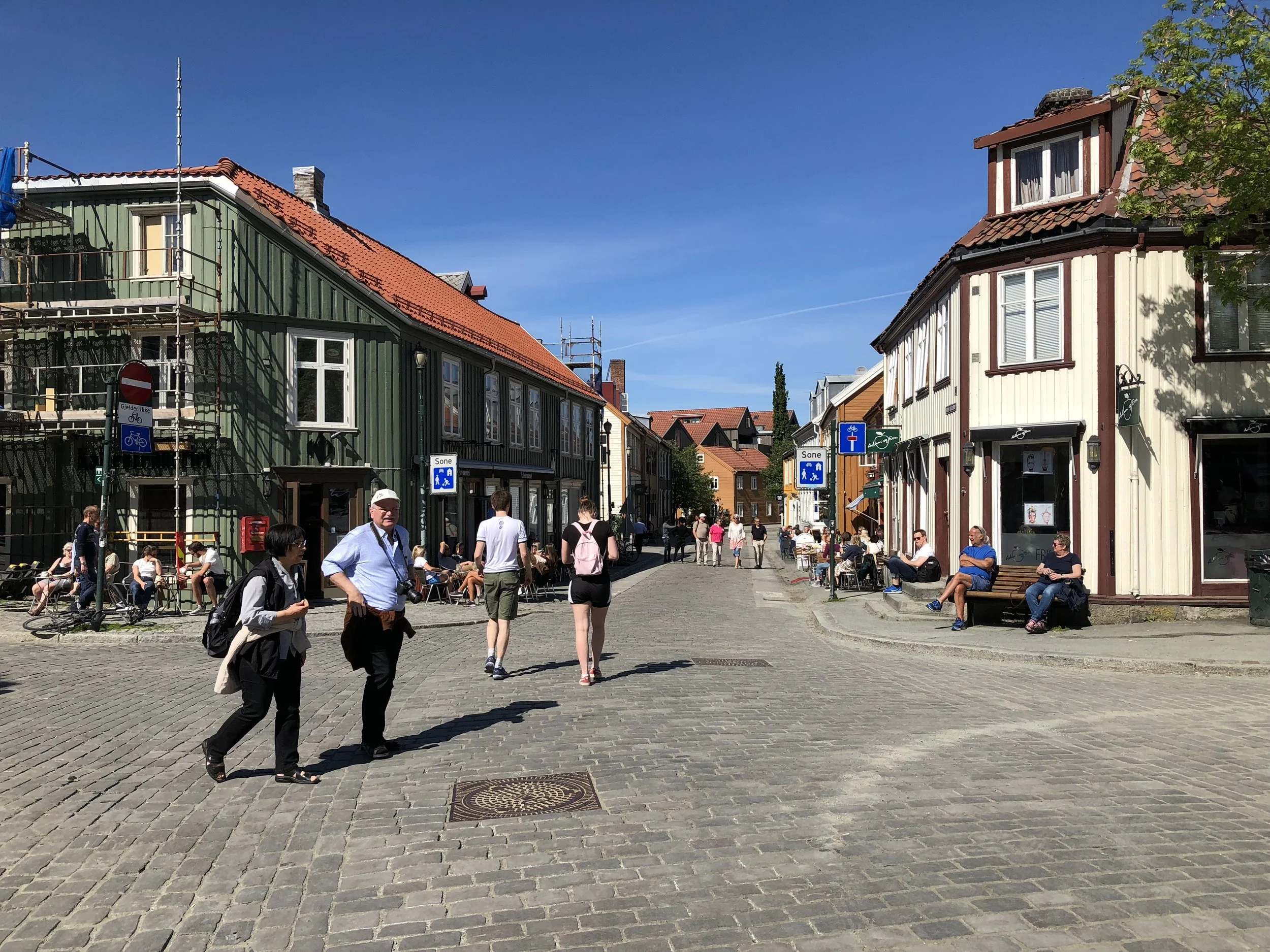 Trondheim, Norway. Streets for walking and gathering, with retail at the street level and housing and offices above, prevent most nuisances from the get-go, but also make people happy and respectful.