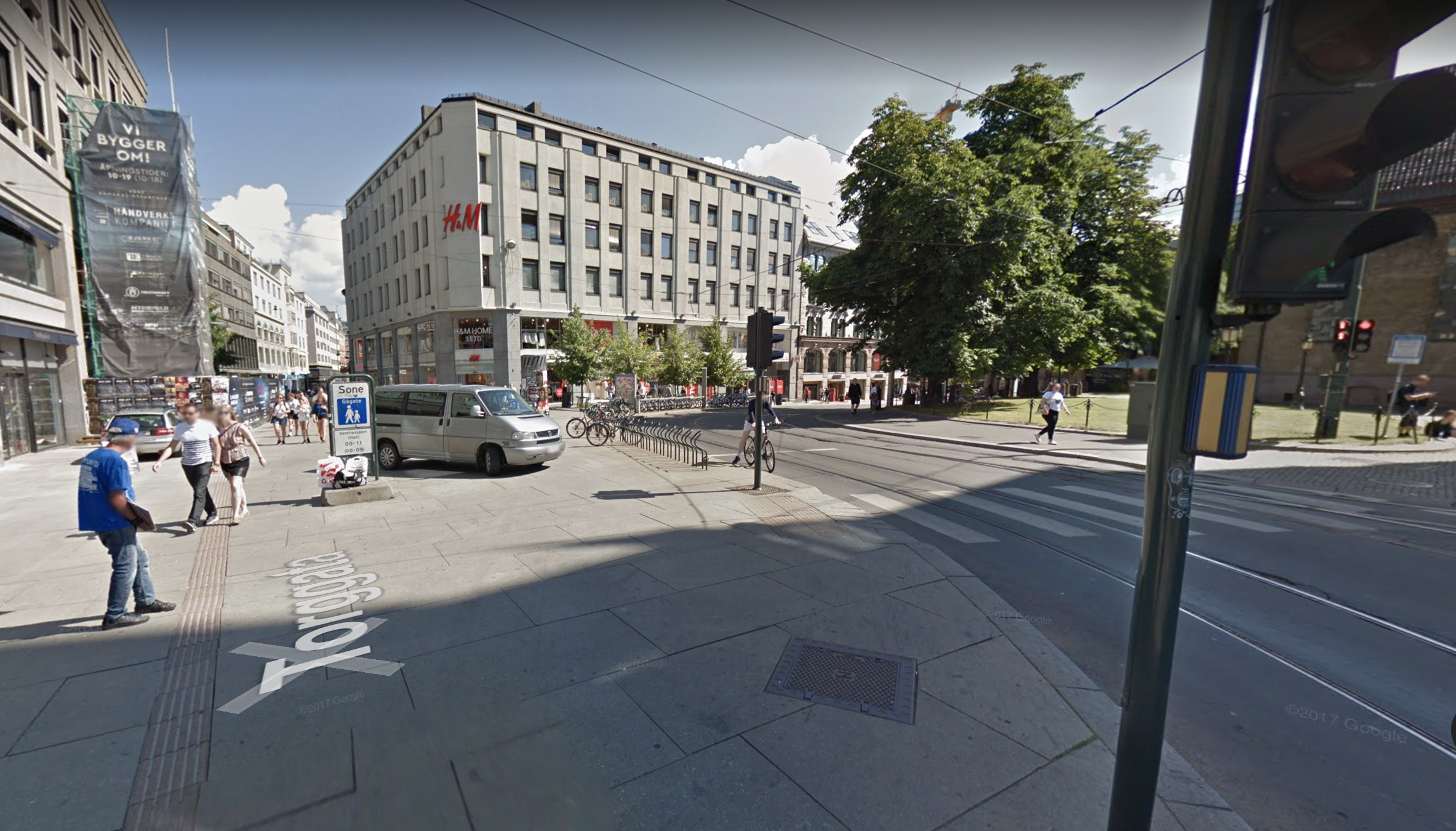 This intersection in downtown Oslo accommodates pedestrians, bikes, trams, buses and cars. The intersection was simplified by pedestrianizing one street, making another one way, and as a result maximizing pedestrian space. In effect it feels less like an intersection and more like a narrow asphalt street (though wide by Oslo standards).