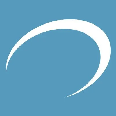 A white crescent shape on a blue background.