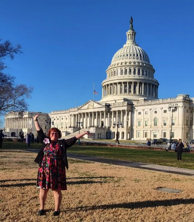  Kim Wilson, eastern washington community health worker stands in front of the capitol building in washington d.c. 