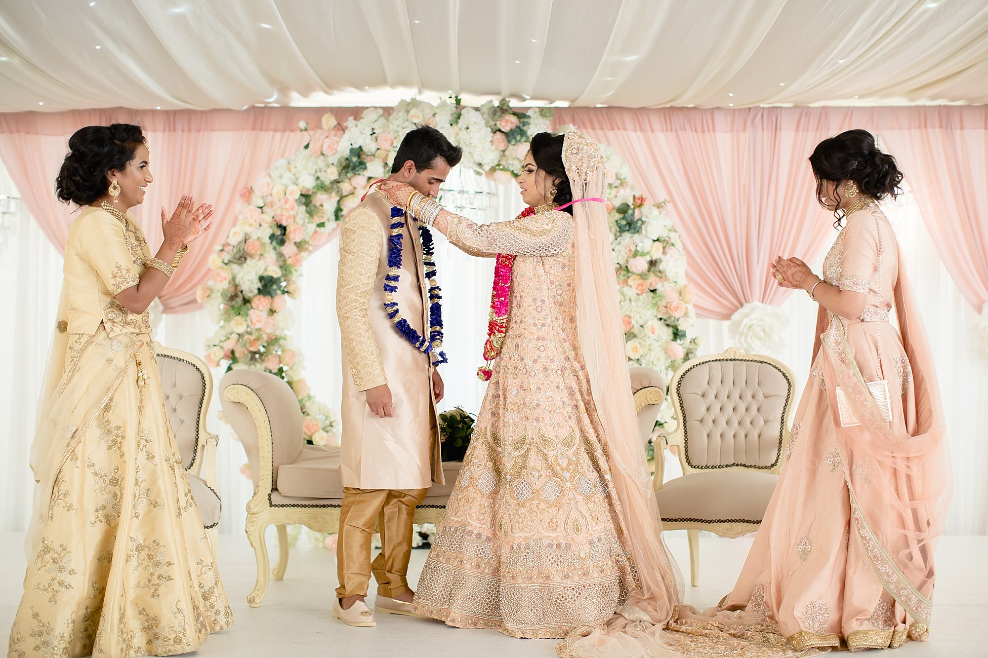 Bride Groom garland exchange photography at Hilton Hall Wolverhampton