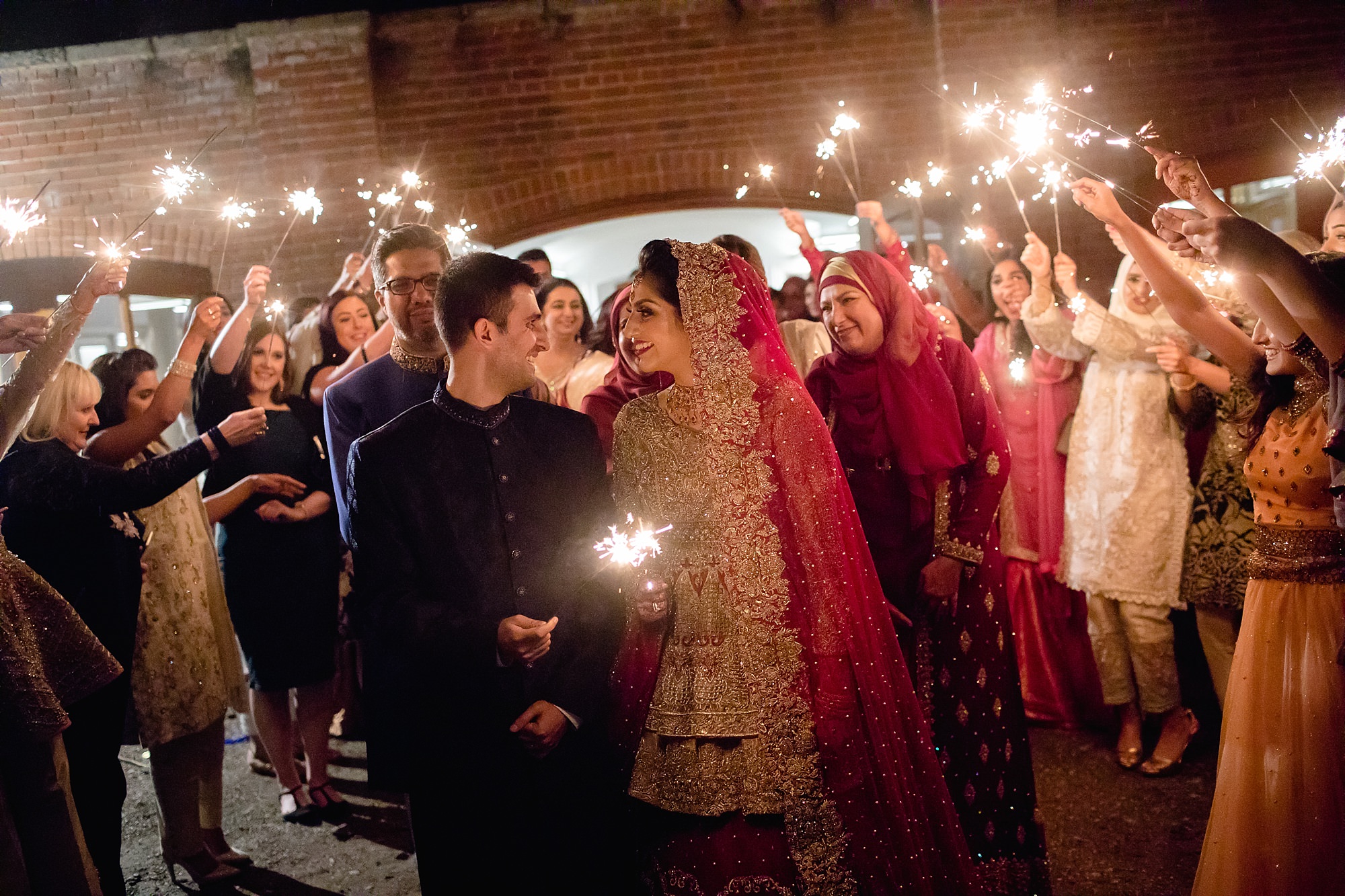 Pakistani Bride sparkler exit rukhsati at Tatton Park wedding Cheshire
