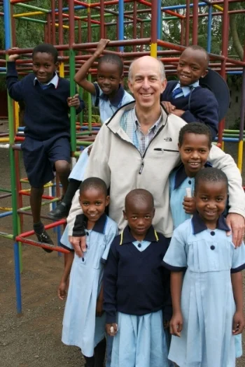 Bob Treitman spending some time with the children of Tanzania during a visit to Tanzania.