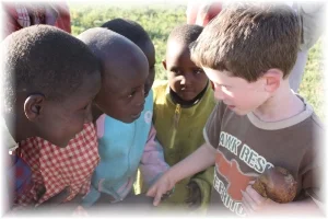 Goodwin-Tanzania BRK with Maasai Children.jpg