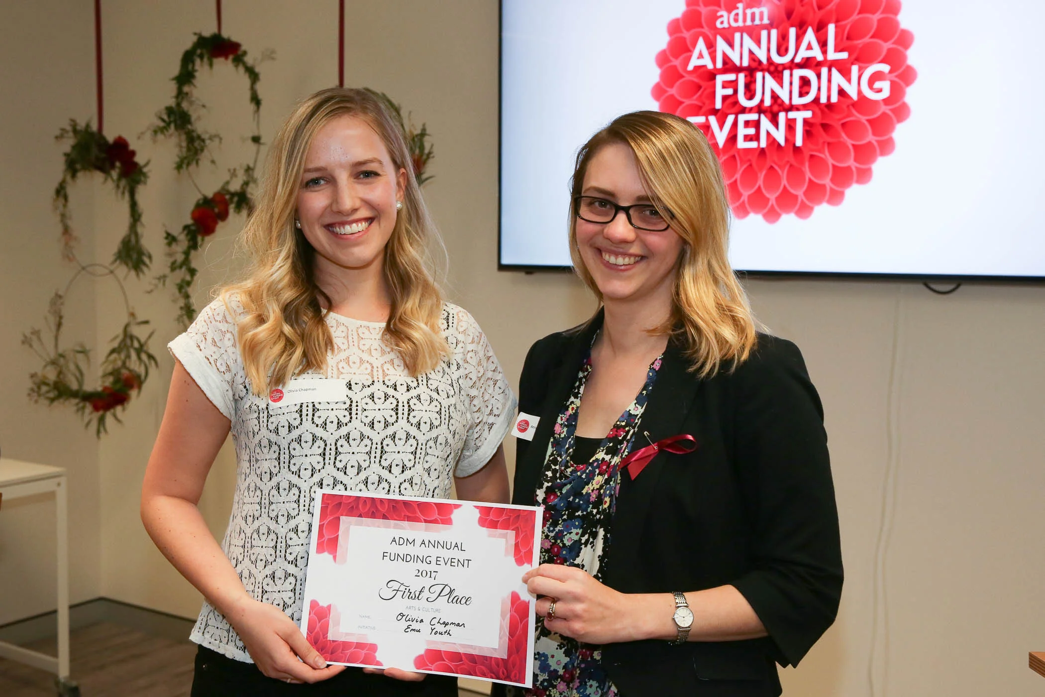 Olivia Chapman, receiving her award from Annette Pierdziwol.