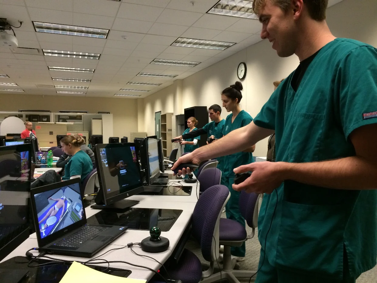 Nursing students using the virtual decontamination training program that I developed at Miami University. &nbsp;Using motion controllers I was able to translate the users actual hand movements into the game for an increased sense of immersion.