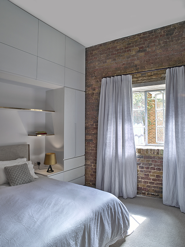 Floor-ceiling joinery in the Master Bedroom makes maximum use of high ceilings, allowing client to sleep in a completely uncluttered space.