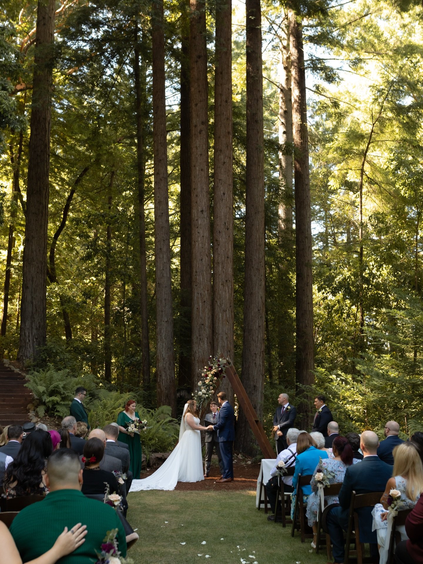Surrounded by the towering Santa Cruz redwoods, Emily and David shared a day as tender as it was unforgettable. In every look and tender touch, their emotions were laid bare. Their ceremony reflected their hearts, full of vulnerability, laughter, and