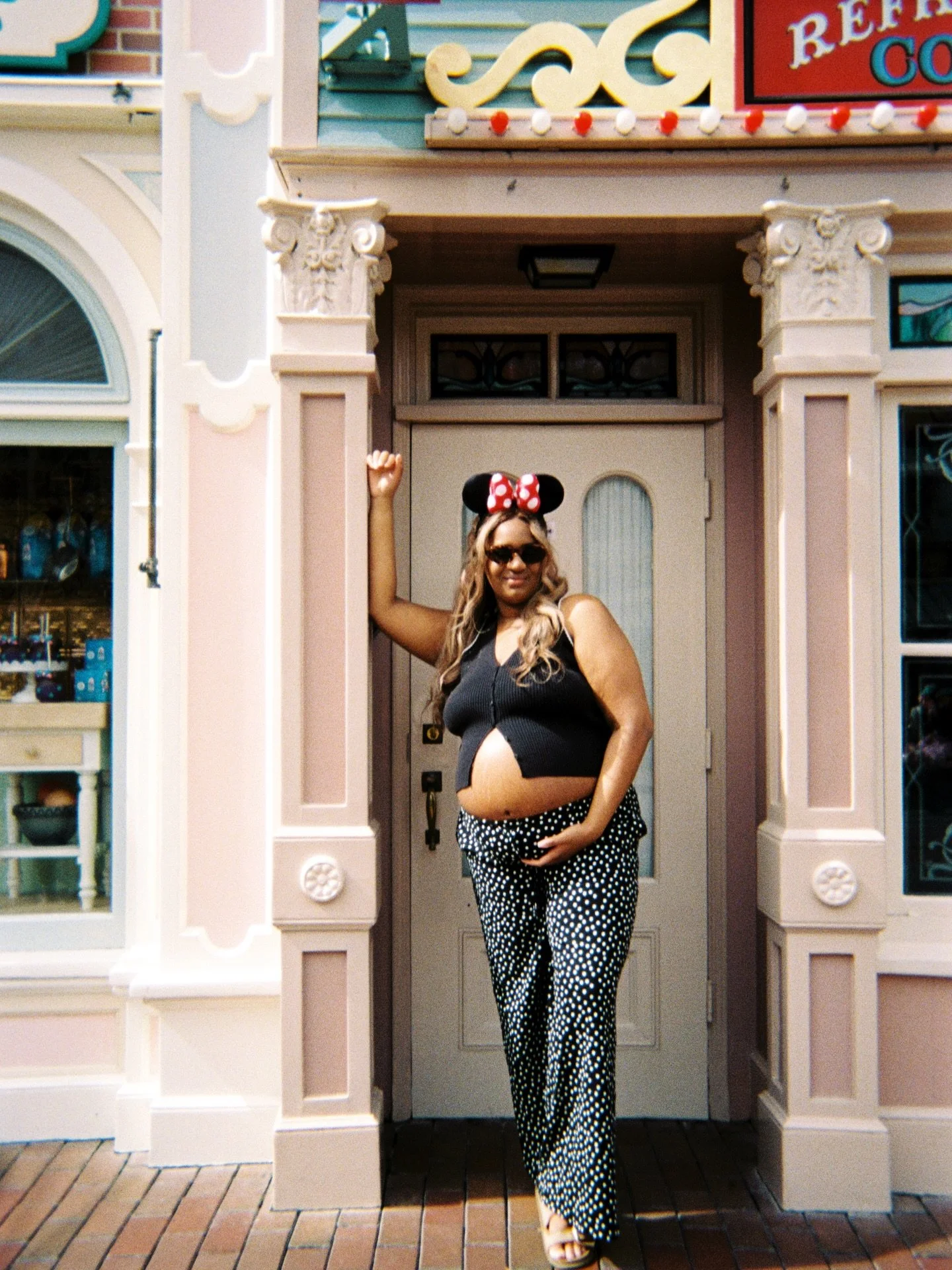 Two girlies captured on film ✨🐭🎀🍿🎞️
Mama glowing, baby girl on the way, and all the Main Street + snack vibes. 

We couldn&rsquo;t wait to share these, digitals coming soon! 💕

#maternity #maternityphotos #disneyonfilm #filmphotography #anaheimp