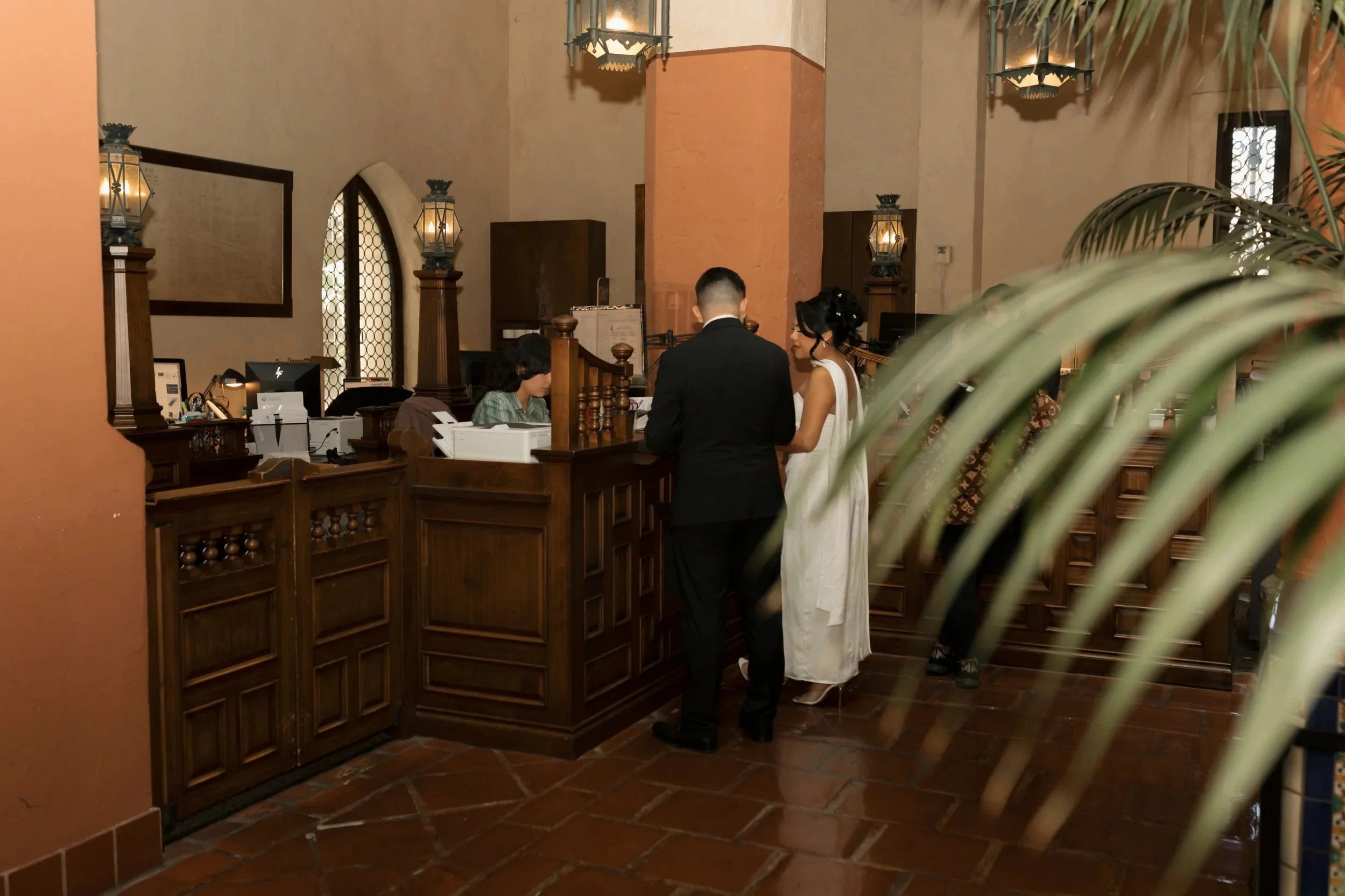 Couple checking into the Hall of Records at the Santa Barbara Courthouse for their elopement ceremony