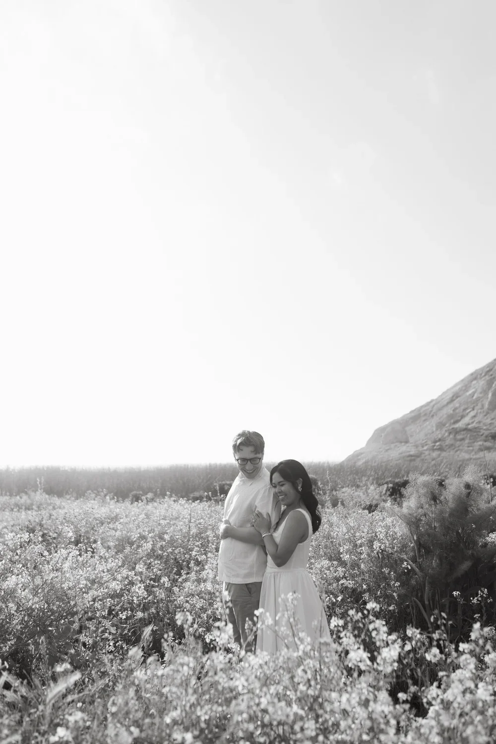 engagement couple photographed by califronia elopement and wedding photographers by the coast near san francsico