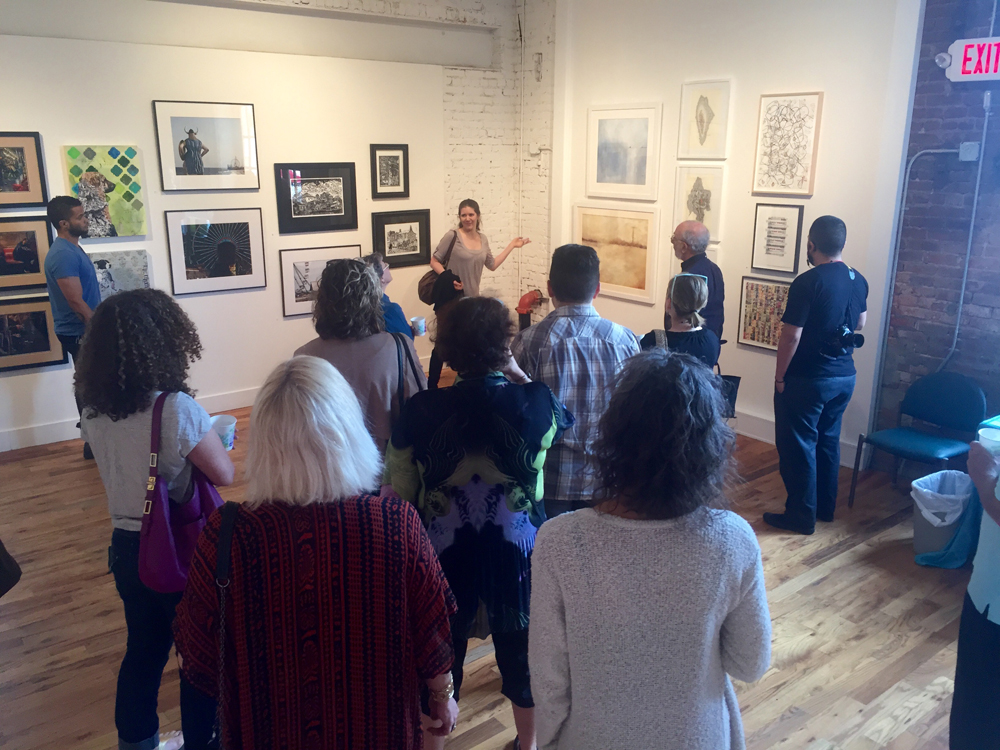 Talking shop with guests at the Firehouse Gallery, Open Orange 2016.