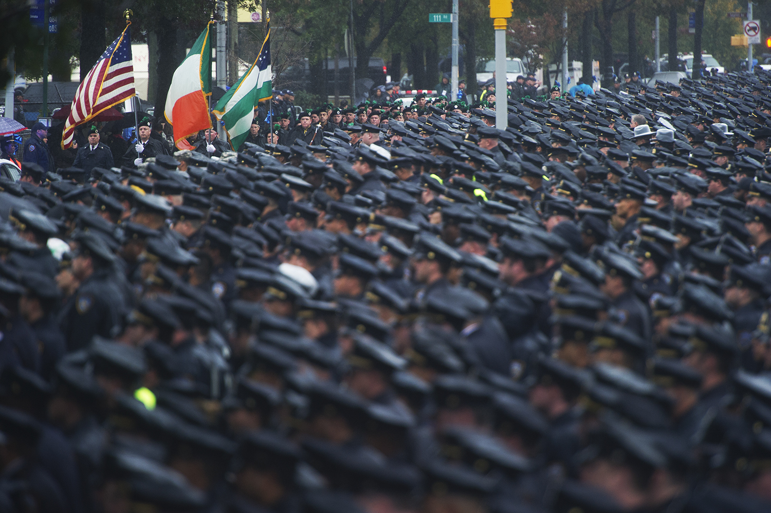 thousands of police officers lined up to honor slain NYPD officer Randolph Hold, outside of The Greater Allen AME Cathedral in Jamaica, Queens at his funeral. Queens, NY. 2015 © Go Nakamura photography