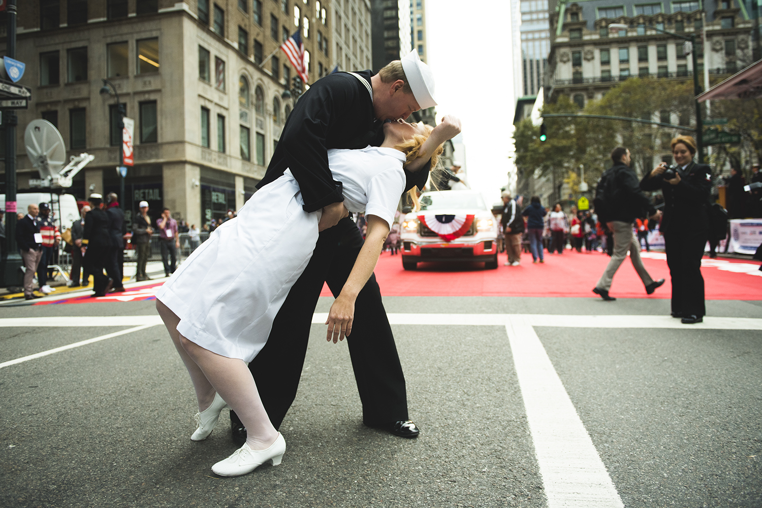 marchers of Veterans Day Parade imitate an iconic "kissing sailor" on 5th Ave Manhattan, NY. 2015 © Go Nakamura photography