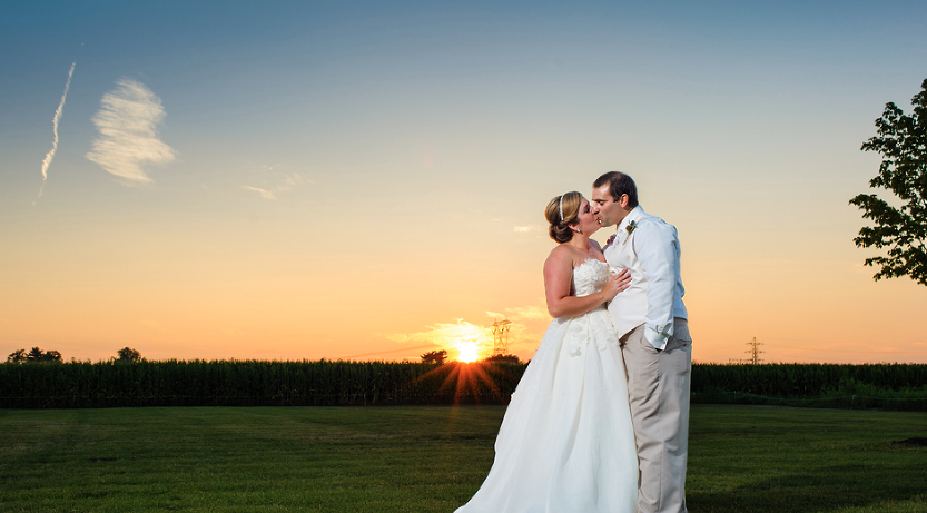 bride and groom at sunset.png