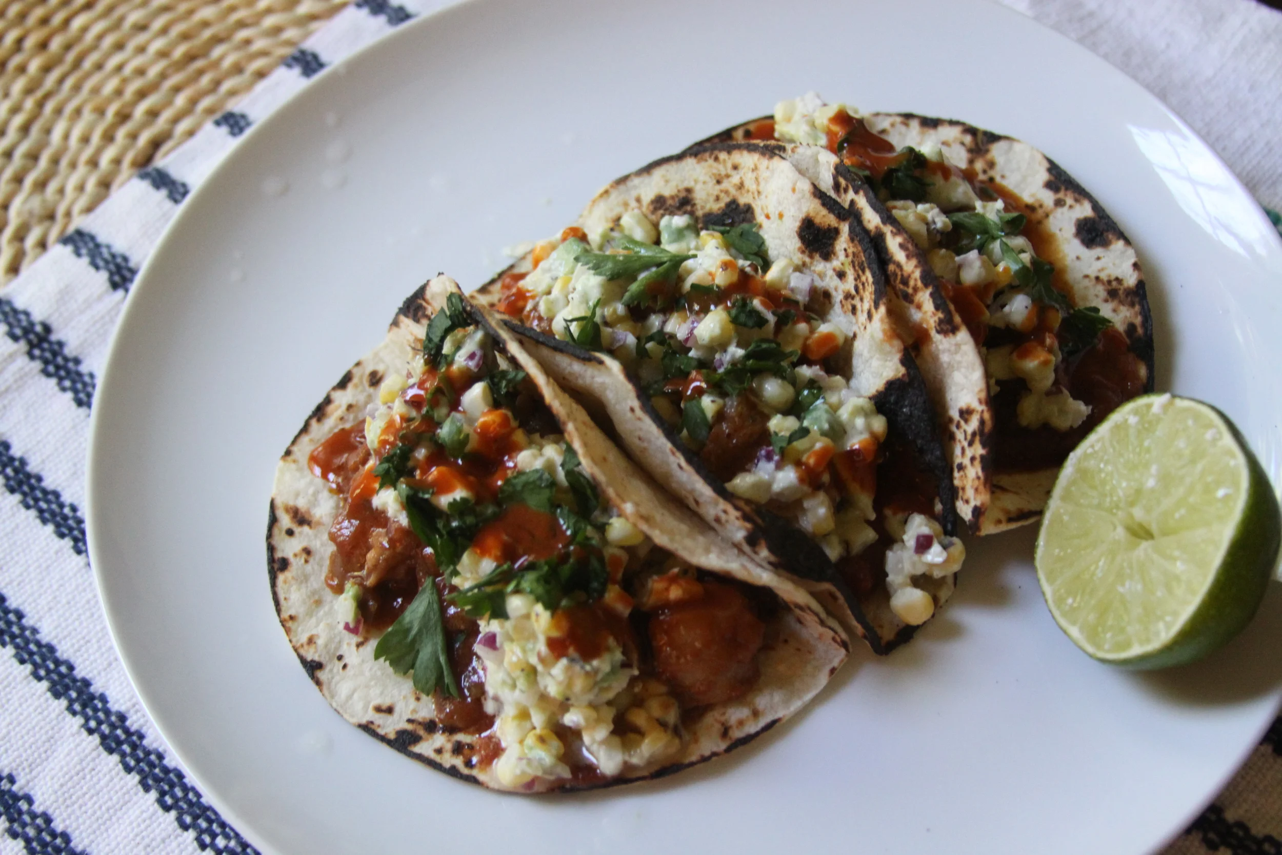 Pollo Guisado Tacos with Elotes Salad