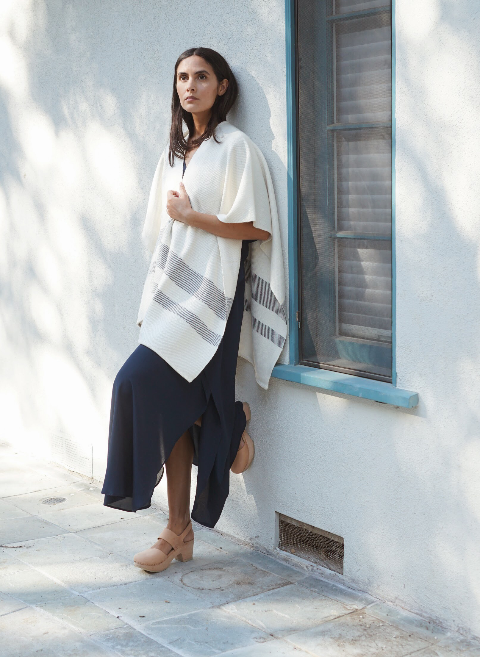   Maiyet  Stripe Hem Poncho in Ivory +  Raven &amp; Lily  Fiza Dress in Navy +   Zuzii   Close Toe Clogs in Natural. 