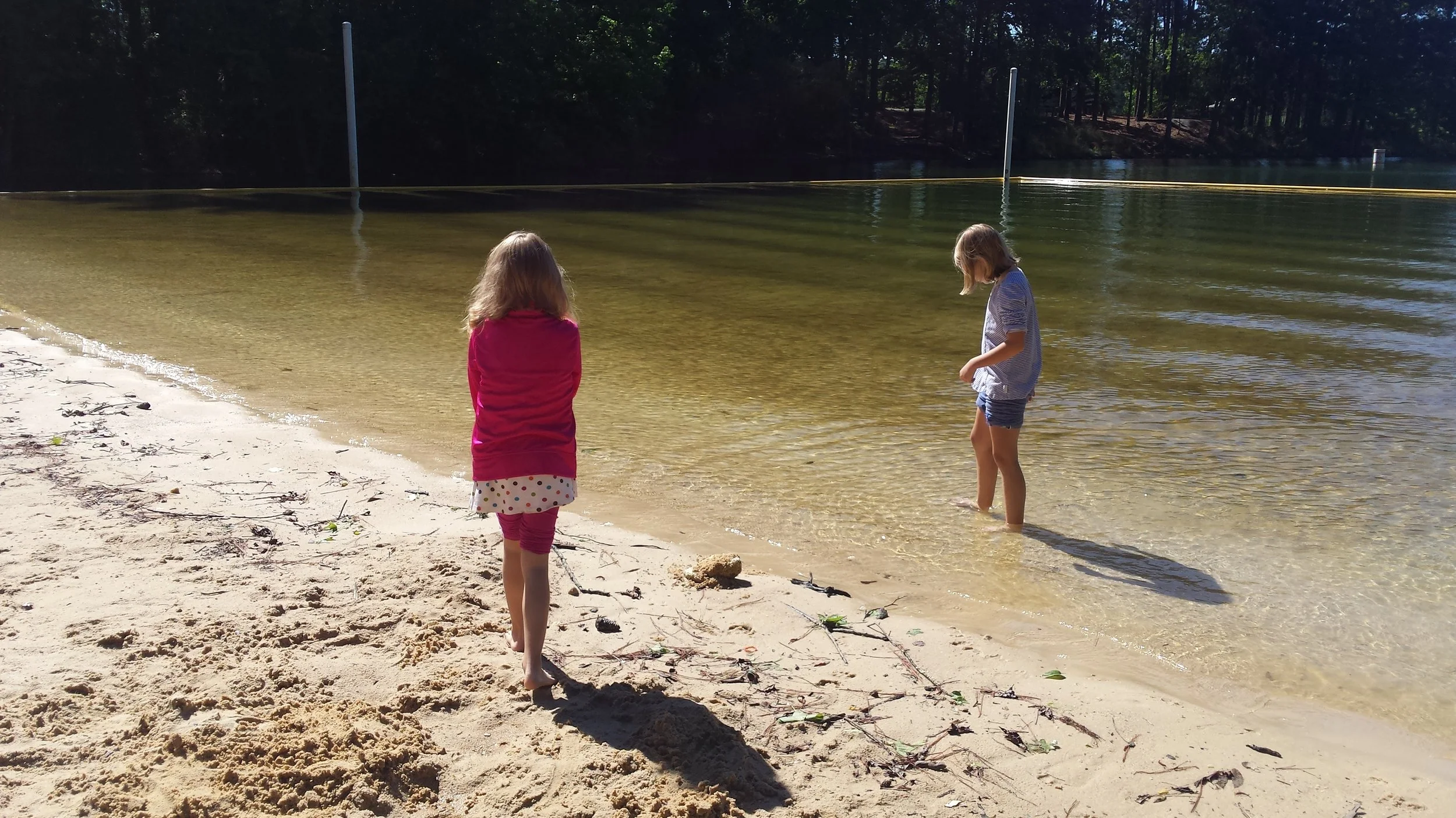 Kids like the beach even if it is rainy and cool. The sun made a brief appearance for us!