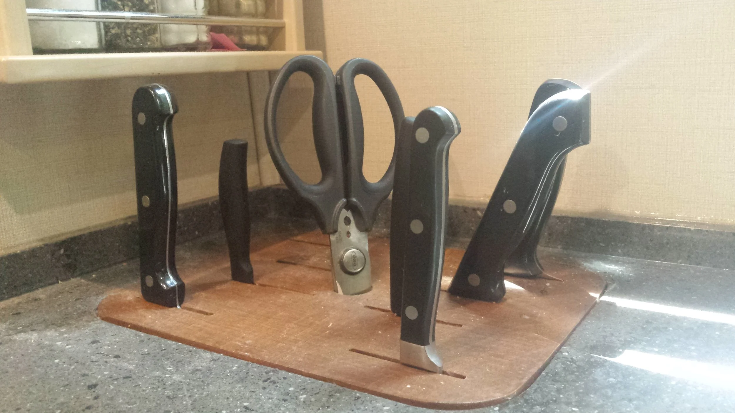 A knife block insert for the RV kitchen counter