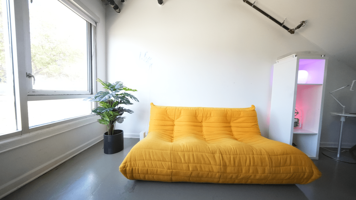 Creator lounge with yellow Togo sofa