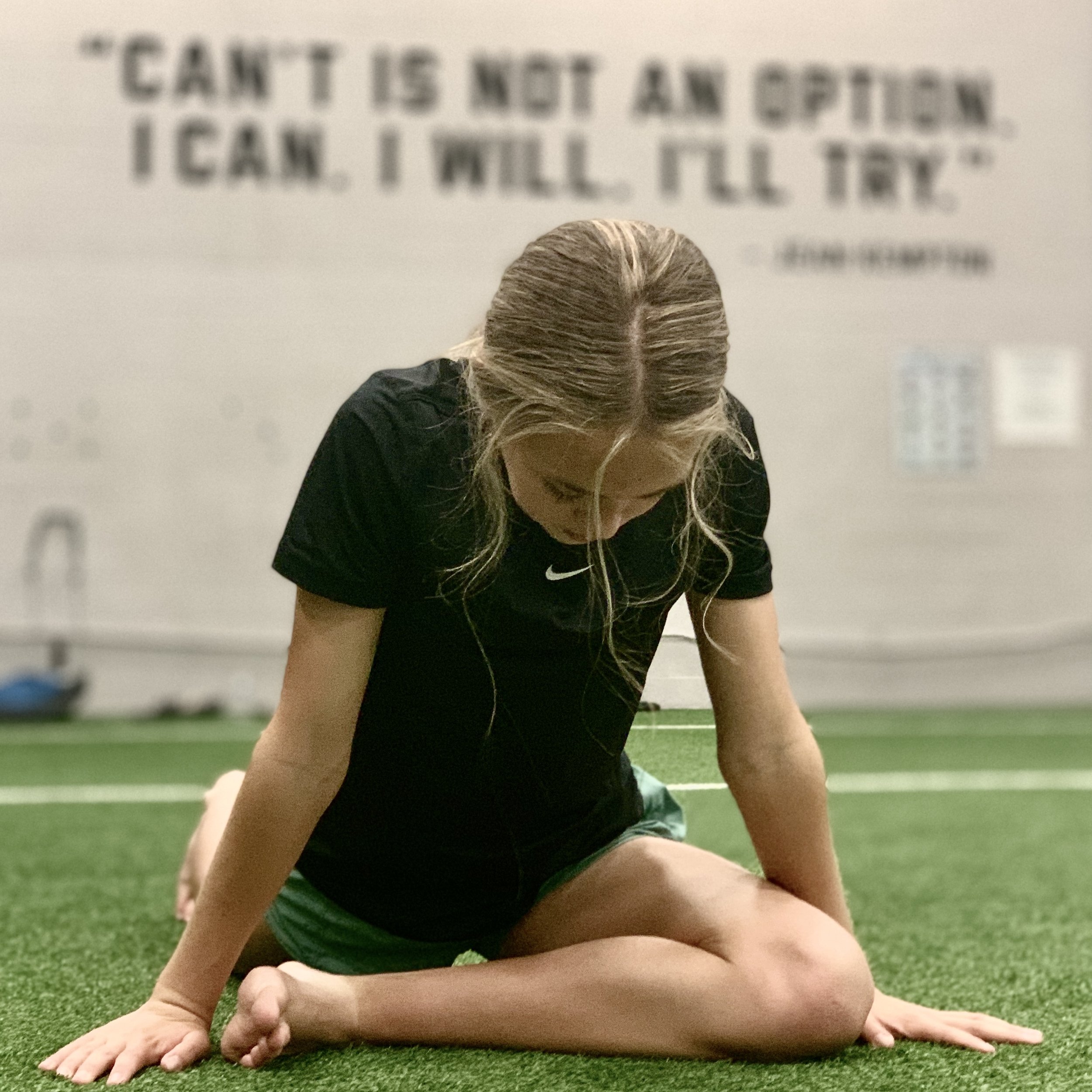 youth female athlete stretching w cant quote in background.jpg
