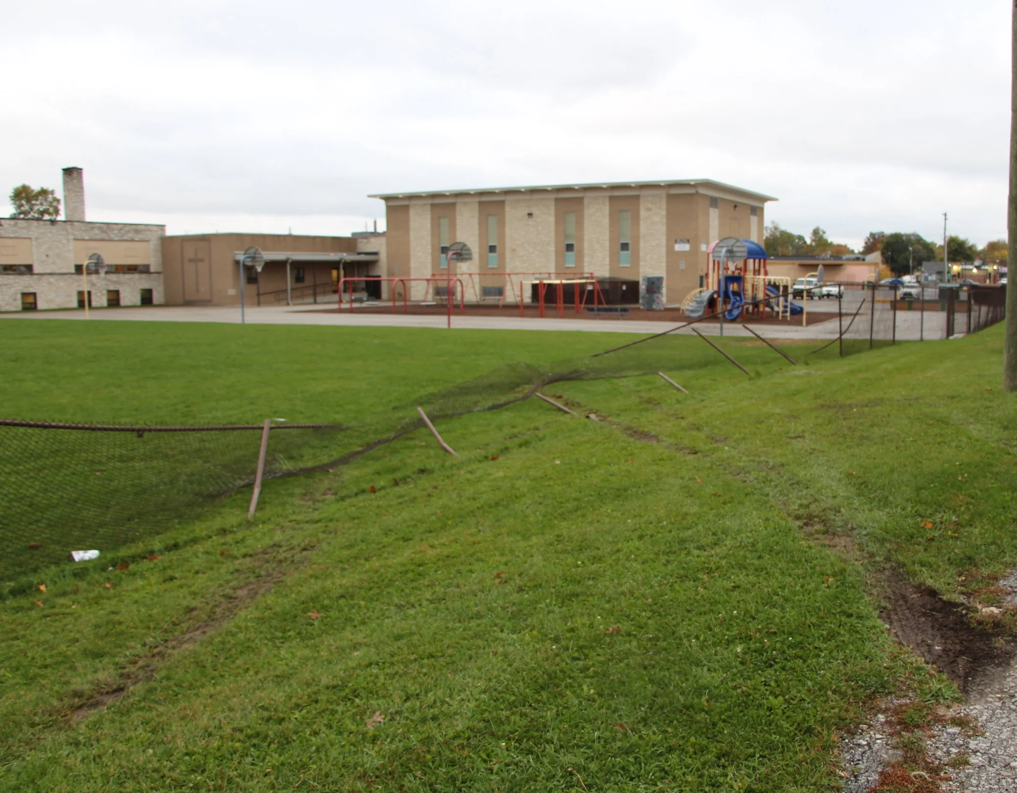 Holy Cross Damage Fence 2.jpg