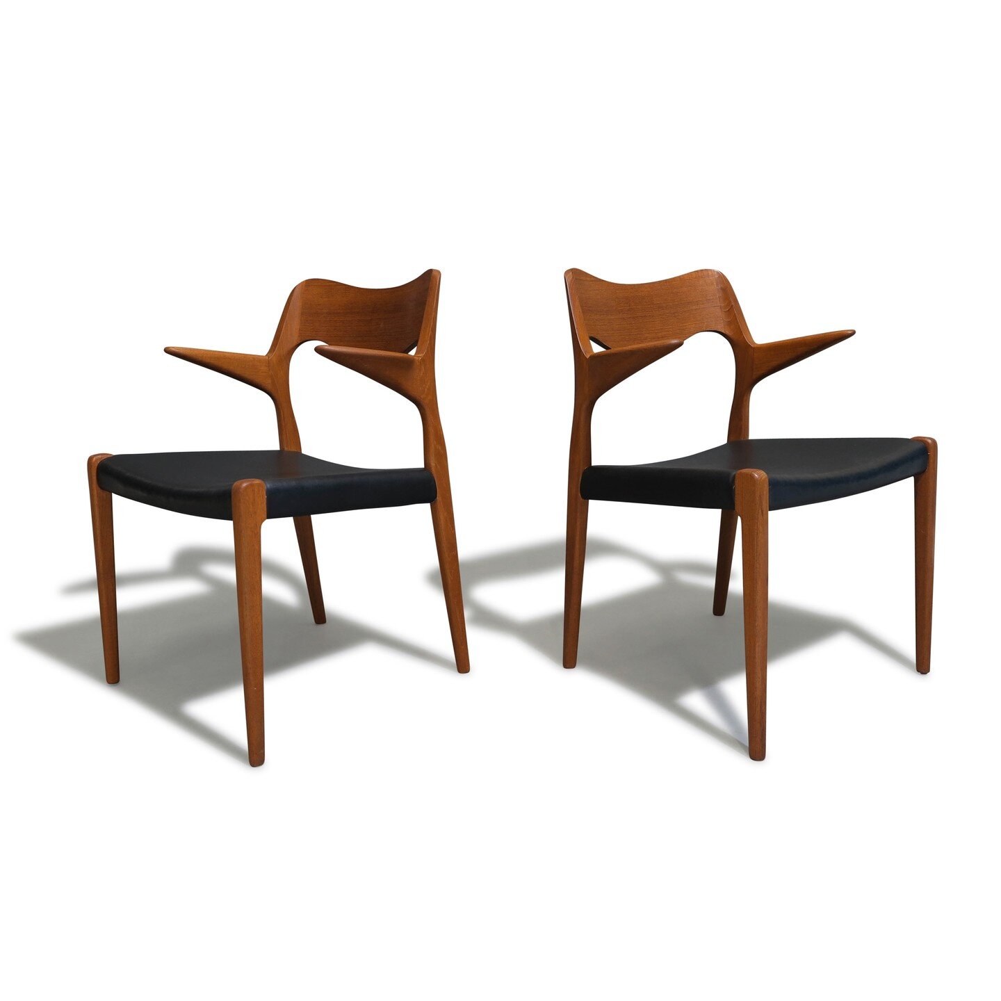 #midcentury #danish #teak #armchairs designed by #nielsmoller for J.L. Moller, Model 55, Denmark, circa 1960. The chair frames are crafted from solid teak, showcasing sculptural floating armrests and upholstered in the original black leather seats.