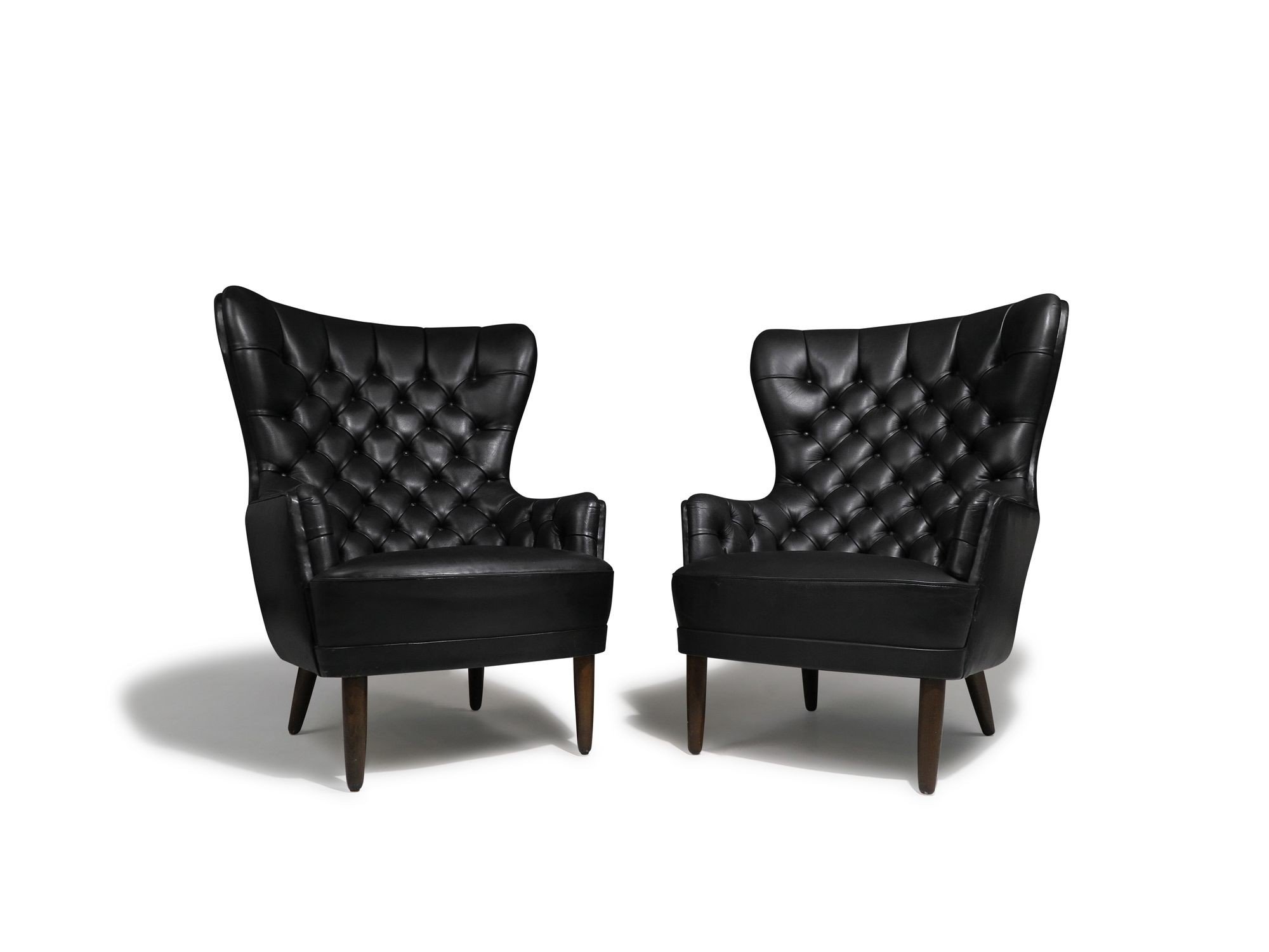 1_Black_Leather_Lounge_Chairs-2.jpeg