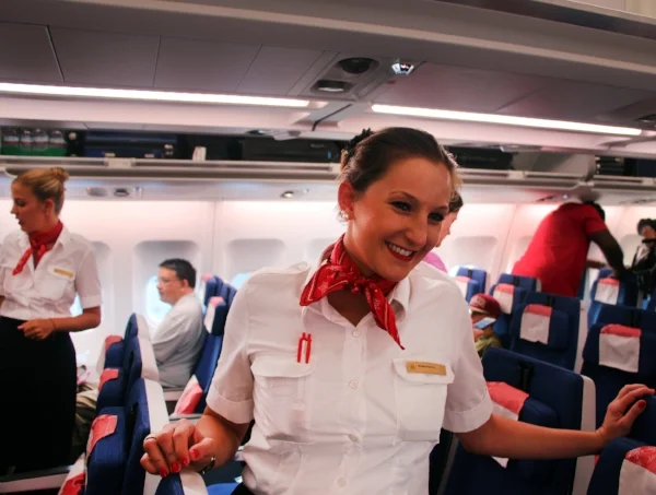 Our gracious Edelweiss flight attendant © Tony DiBona