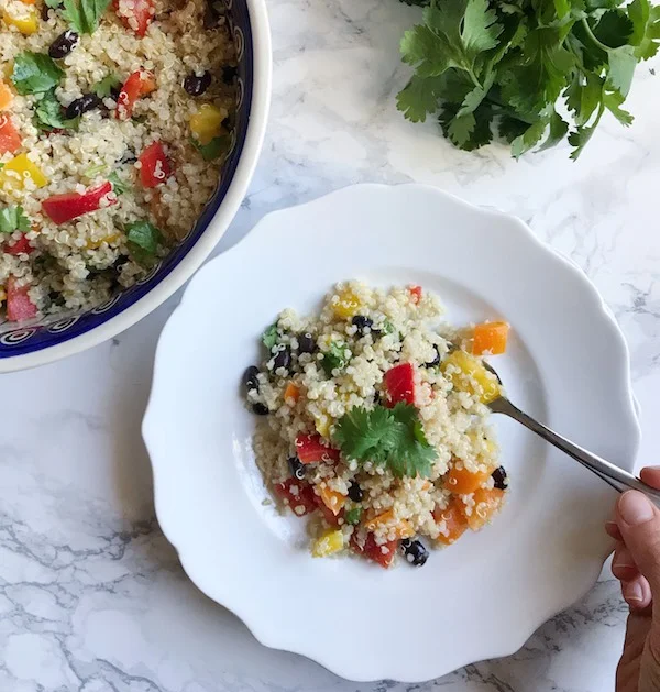 eating-black-bean-quinoa-salad.jpg