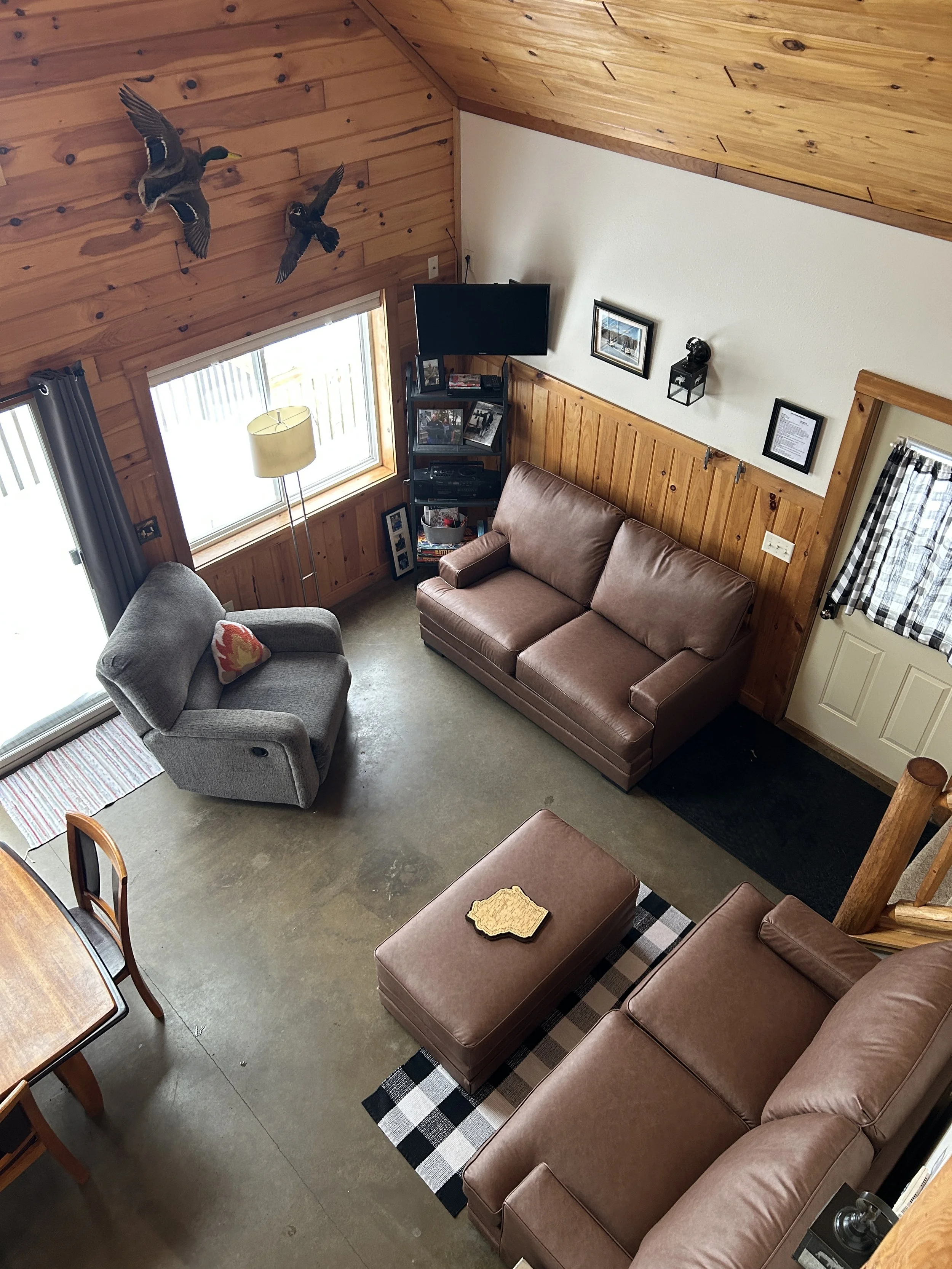  View of living room area from lofted bedroom 