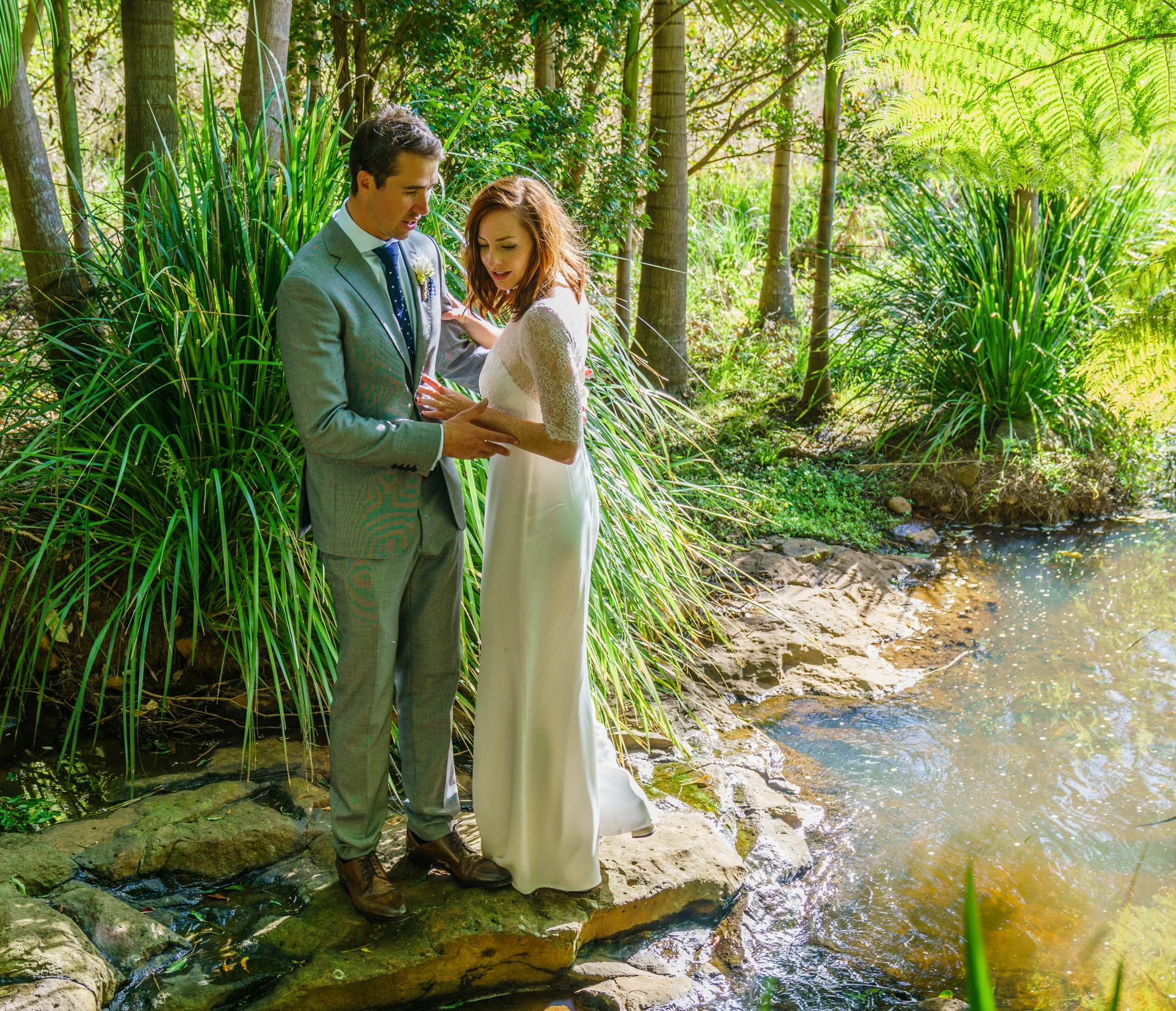 Bride & Groom By The Creek