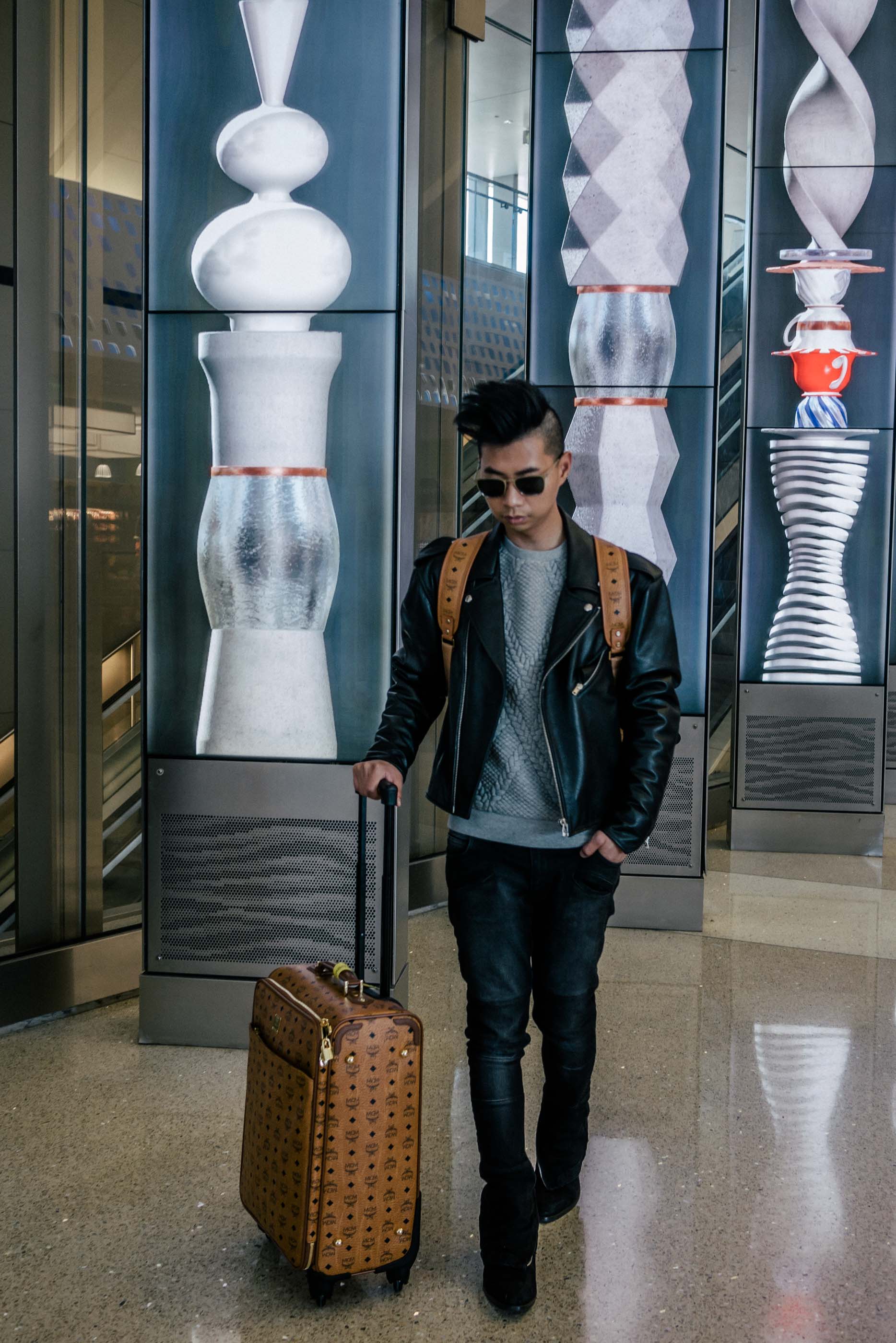 In my usual travel uniform and my MCM carry-on luggage