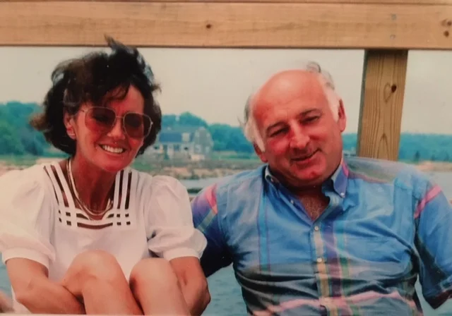 A photo of my late grandparents; Helen & Dick Arthur looking joyful at their house in Marion, MA.