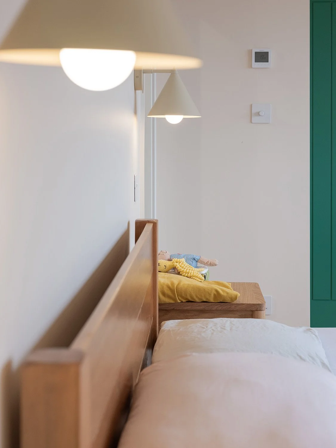 twickenham-renovation-bedroom-bedside-lamps-green-door.jpg.jpg