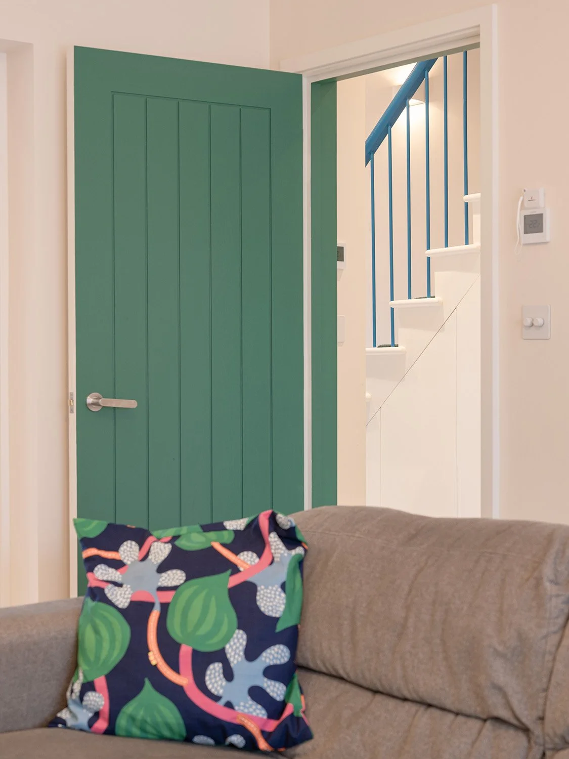 twickenham-renovation-living-green-door-staircase.jpg.jpg