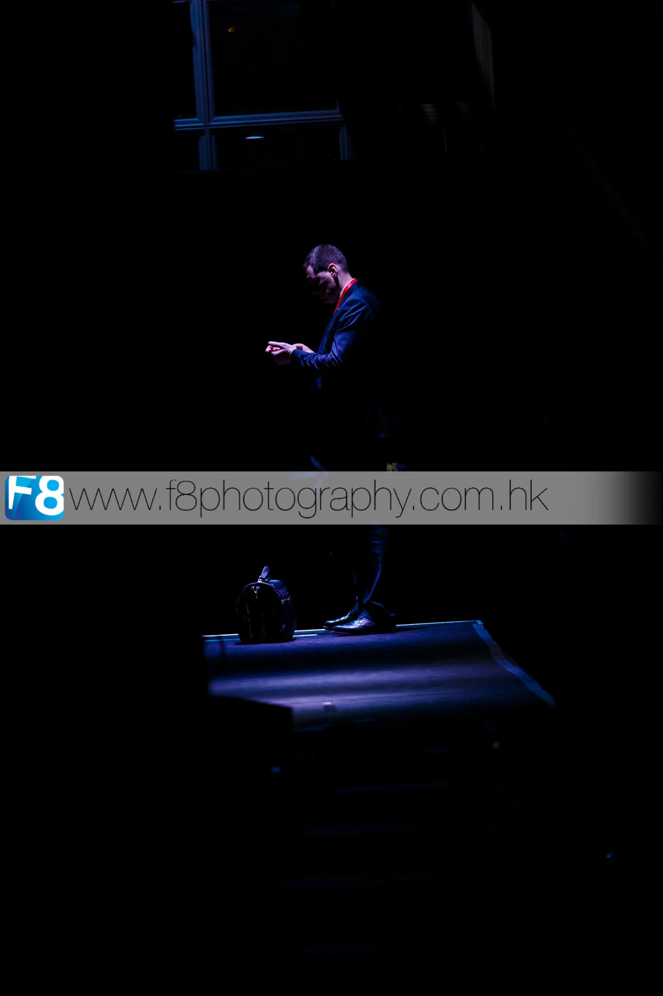 Security was tight, personal body guard stands backstage for Russian Prime Minister Dmitry Medvedev, whats in the bag! 