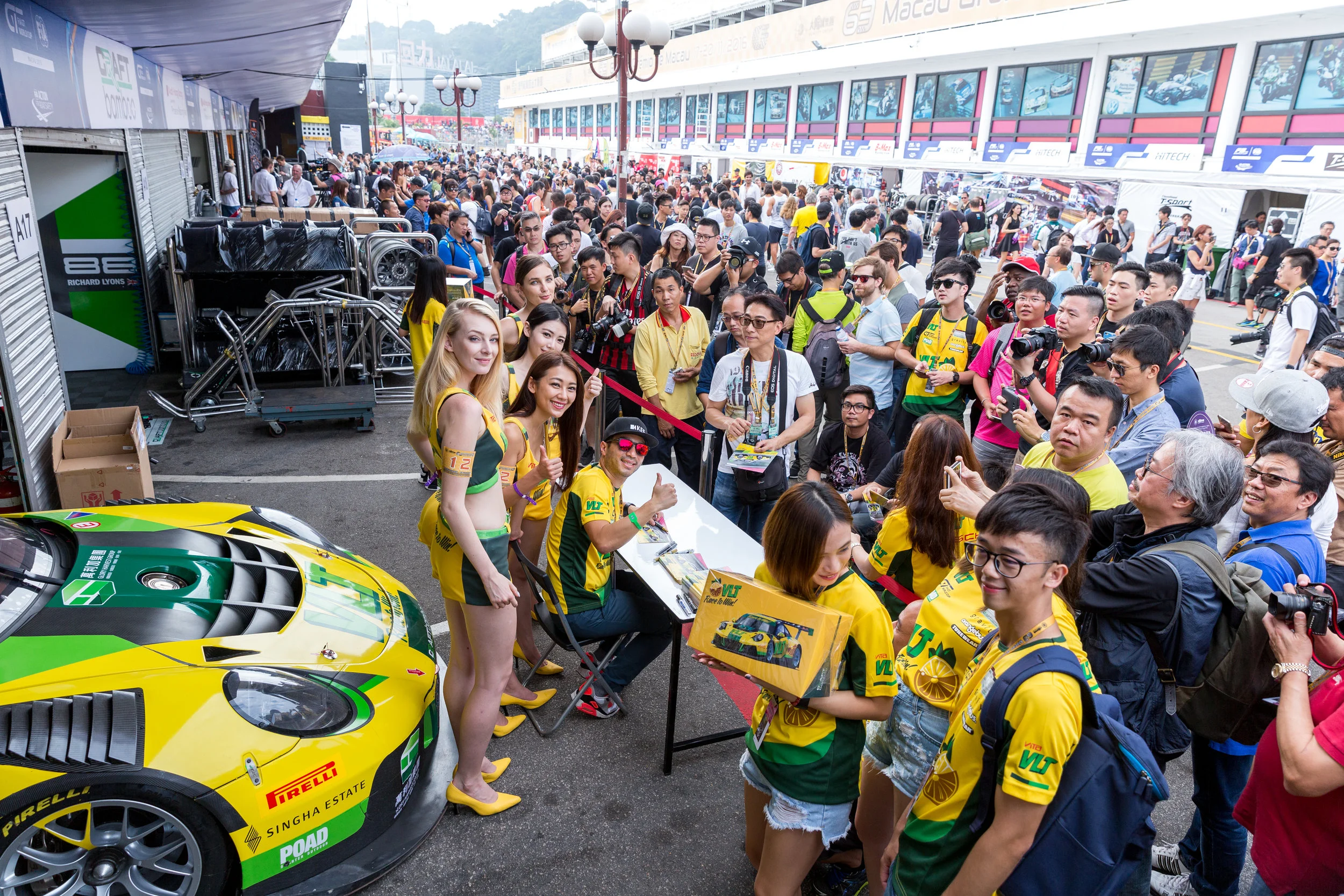 Autograph session in the paddock with Darryl O'young and the VLT racing Queens.