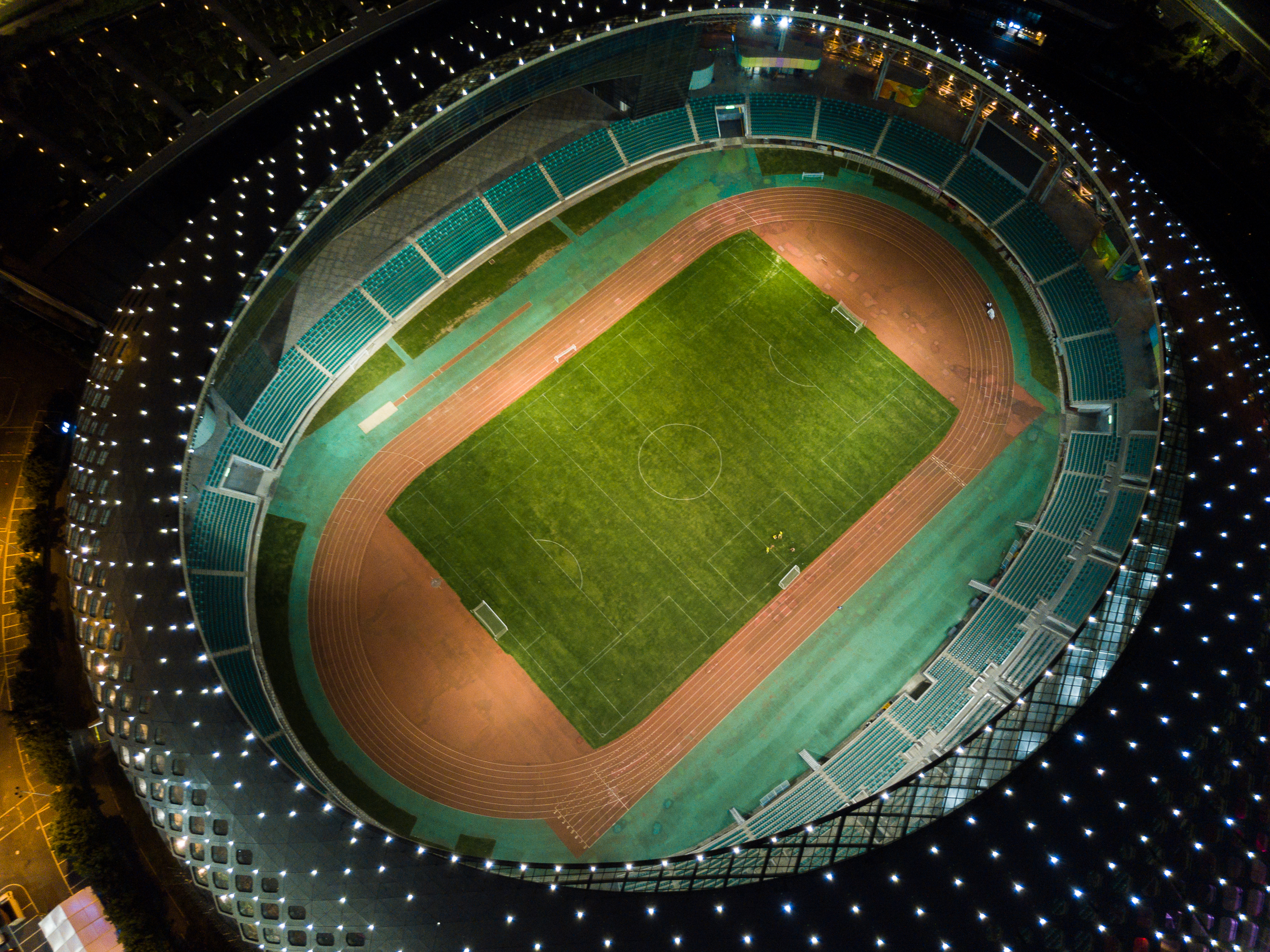 Night view of the Shenzhen Bay Sports Centre Football pitch.