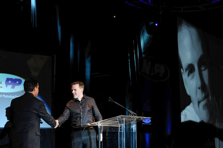 Larry welcomes John to the stage for his Hall of Fame acceptance speech.