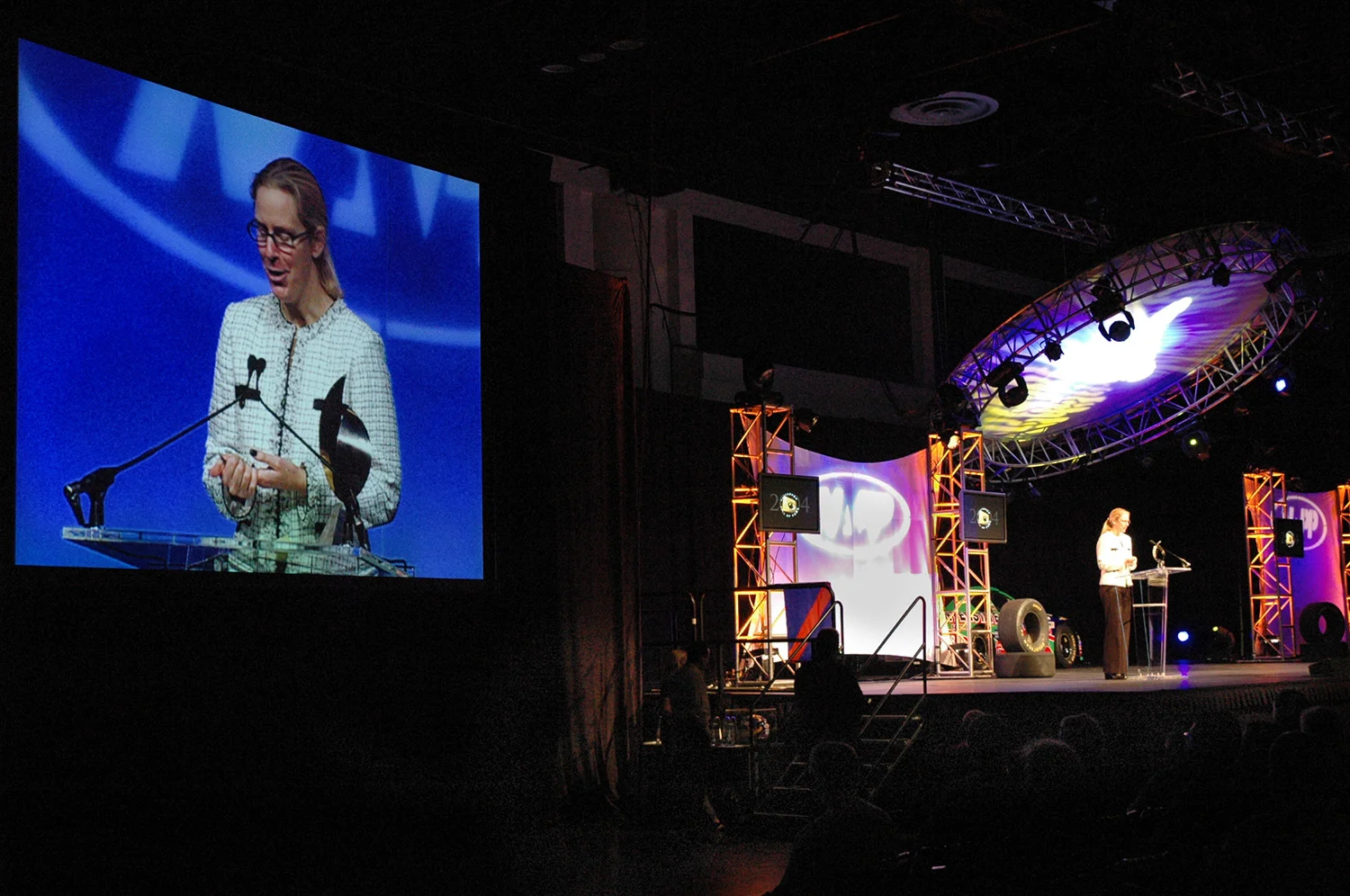 Julieanne at the podium accepting her award.