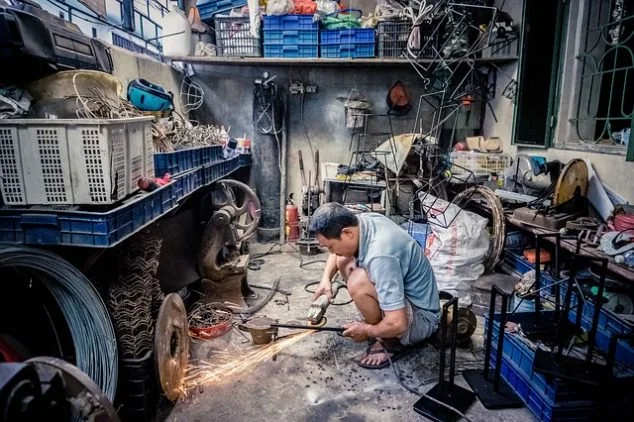 If you enjoy hand-crafted furniture, bike building and repair, or any other hobby that demands square footage, this is the man cave for you.
