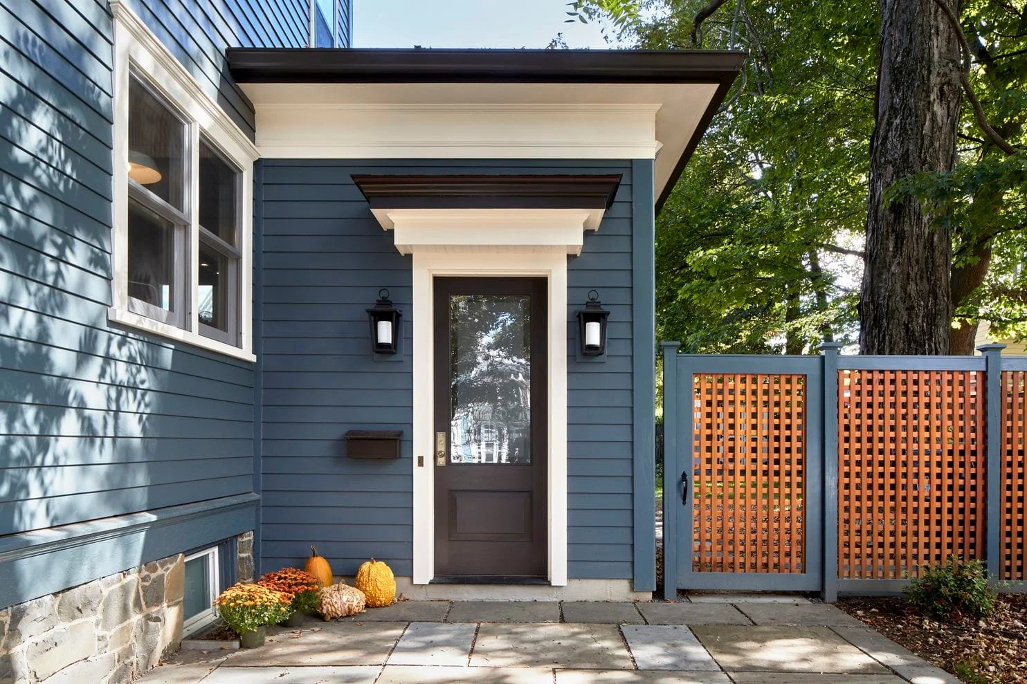 In a Hudson Valley Victorian house renovated by Studio For’s Fauzia Khanani, a new addition replaces the previous one, but at the back of the property to preserve the original design. (For Design) You’ve scoured real estate listings, survived a bidding war and finally closed on a historical home — maybe a free-standing Victorian or Federal-style rowhouse — and want to bring it into the 21st century. You may think the hard part is over, but renovation experts say plenty of pitfalls remain. We asked them where most homeowners trip up. Not researching the history Digging into your home’s past can be fun, but it can also help you make aesthetic decisions and avoid costly mistakes. Architect Anik Pearson recalls a New York client who wanted to install a pool in his basement. She referred to historical maps of Manhattan that showed where all the waterways, wetlands and hills existed, and discovered a river underneath the townhouse. “They poked a hole in the basement and sure enough, there was running water. The river was still there.” You can aid the renovation process by conducting your own research ahead of time. Look at old maps from your local historical society or online through the U.S. Geological Survey, educate yourself about which materials are right for your home’s climate and setting, and visit a museum that has period rooms based on your home’s era. Look back at the real estate listing, if you can, because many agents of older properties include a backstory and ownership history. There are also books — such as “ Victorian Architectural Details ” by A.J. Bicknell & Co. and “ The American Builder’s Companion ” by Asher Benjamin — that show historical precedence, proportions, molding shape used during specific eras, and style differentiation between, say, Victorian gingerbread and gothic revival. “All of those styles have a specific language that has been recorded carefully in these books,” Pearson says. Trying DIY In this age of HGTV shows and YouTube tutorials, many homeowners consider bypassing a professional for what they think are easy cosmetic alterations. But mistakes can cost them more than an architect’s fee. A common example is when homeowners try restoring curb appeal with quick-and-dirty fixes, such as power-washing a stain or painting over an ugly house color. Stripping or removing paint is especially an area to exercise caution: Although in newer homes it’s safer because modern paints don’t contain harmful substances such as lead, old paints can contain such substances. But simply applying a new coat shouldn’t be a problem for DIYers. “Cosmetic improvements that don’t affect any systems are usually safe DIY projects,” says Naomi Miroglio of San Francisco-based Architectural Resources Group. But “if finishes need to be removed or walls opened up, it should be left to a professional.” She points to replacing faucets in bathroom sinks, typically an easy DIY project in newer homes, as an example of what not to do in older homes. “Often the cutouts in the porcelain for the faucet and knobs are at different dimensions than current faucet assemblies. One has to look for salvage pieces or custom-order them.” Miroglio also recommends leaving electrical and plumbing work to the professionals because of the safety risks. Adding pristine, new elements Many owners of older homes will either refinish the original elements, such as the woodwork, or install reproductions. Juxtaposed with the worn details, however, these pristine copies or gleaming finishes can look out of place. Worse yet, some of the materials used in decorative reproductions lack the quality and durability of the original materials. “Some contractors think it’s more trouble to save decorative pieces than work around them,” Miroglio says. “You might have four beautiful column capitals and one bad one. They’ll suggest replacing them all to look the same. Often it’s a cheaper material inside like Styrofoam.” Or, she adds, they’ll strip and re-stain the wood floors, resulting in an overly pristine appearance that’s lost a lot of character. Instead, she recommends retaining some of the aged look. “It’s arrested decay: You stop it from decaying but avoid making it look brand new.” The elements could be historical finishes or objects that aren’t in perfect condition, such as light fixtures with a worn metal finish, wood trim that shows signs of wear and crackled paint on a ceiling light medallion. “We’ve even seen layers of peeling wallpaper and exposed plaster kept intact with a clear coating applied,” Miroglio says. Architect Adam Zimmerman of Zimmerman Workshop agrees: “Nothing looks worse than antique details directly adjacent to poorly done new ones that are deliberately trying to match. The new will highlight how dilapidated the old really looks.” He offers a trick to avoid this: “Let’s say you have historic baseboards and you decide to build a new wall. We might borrow the baseboards from rooms in other parts of the home for the wall. Or, if you have to mismatch within the same room, use similar style and scale, and then break old from new so that they’re not in direct contact. It always comes down to the details.” Installing vinyl windows Older, unrenovated homes aren’t going to win any awards for energy efficiency. So many homeowners target those drafty wooden windows for replacement. But architects caution against choosing modern vinyl options. “Even though a wood window will cost a lot more than vinyl or aluminum, the wood is worth the investment because it can survive a hundred years,” Pearson says. “Vinyl clad won’t last for more than 10 or 20 years, and metal clad is better than vinyl but in arid climates.” Looking at it from a preservationist standpoint, Miroglio argues: “It’s always more sustainable to keep something rather than replace it. We work hard with homeowners to understand how you can weatherize wood double-hung windows. Maybe they just need new putty.” Tiptoeing around technology Implementing modern technology, such as home automation, is a hot topic. Fortunately, the nature of WiFi means there’s no need to rewire the house or install high-tech devices out in the open. “There’s no reason a thermostat has to be in plain view. You could keep it in a closet and use a hidden sensor that no one sees,” Pearson says. You can also find replacements that function in a modern way but look old-fashioned. “There’s a market for this type of product now,” says Fauzia Khanani of New York’s Studio For . “Great brands are making products with modern technology and a historic look, such as light switches.” Shops including Rejuvenation and House of Antique Hardware carry reproduction push-button light switches with discreet dimmer functions, for instance. Being afraid to remove walls Architects are divided on the idea of opening up historical homes. But older floor plans can clash with modern-day living, and a well-renovated and expanded kitchen, for example, can increase the value of most properties. And an open concept might serve some families better than a compartmentalized layout. “It’s important to work with the original spatial organization, but some historic structures didn’t originally have kitchens. They were additions,” Miroglio says. “Such areas are ripe for adapting, and the kitchen as the center of a house is really big.” “It’s perfectly acceptable to knock down walls,” Pearson says, but this also can go beyond a kitchen space. “There is a history of people altering structures, adding on wings at different times. We’re just one step in a larger picture. What’s important is that the structure isn’t being torn down but reused.” If you expect to sell the home in the future, keep in mind that “value is directly connected to things like square feet, kitchens, and room and bathroom count,” Zimmerman says. “Reducing any of those on paper — like the house size or number of bathrooms — would certainly work against you. These are marketing stats prospective buyers read before even deciding to view a property.” Khanani warns that it’s possible to go too far in the hunt for an open concept. In older homes, “each room had a specific function and there was a transition, whether doors or a threshold.” She adds, “There is something about each one of those spaces that made it unique, so taking that away takes away something from the house.” Adding square footage Most architects agree that additions, when done with care, are acceptable. But not all additions are tasteful. Khanani points to a Victorian in New York’s Hudson Valley that she recently renovated. “There was an awkward addition that was functional but looked like an appendage and not part of the original design intent,” despite it stylistically matching the finishes and details of the rest of the house. And its placement at the side of the house made it visible from the street. Khanani removed it entirely, and there uncovered a beautiful bay window with a window seat, which she restored. Then, to reclaim the square footage lost, she designed an addition on the back side of the house that was about the same size as the previous addition. Read the full article HERE Renovate Your Historic Home Now