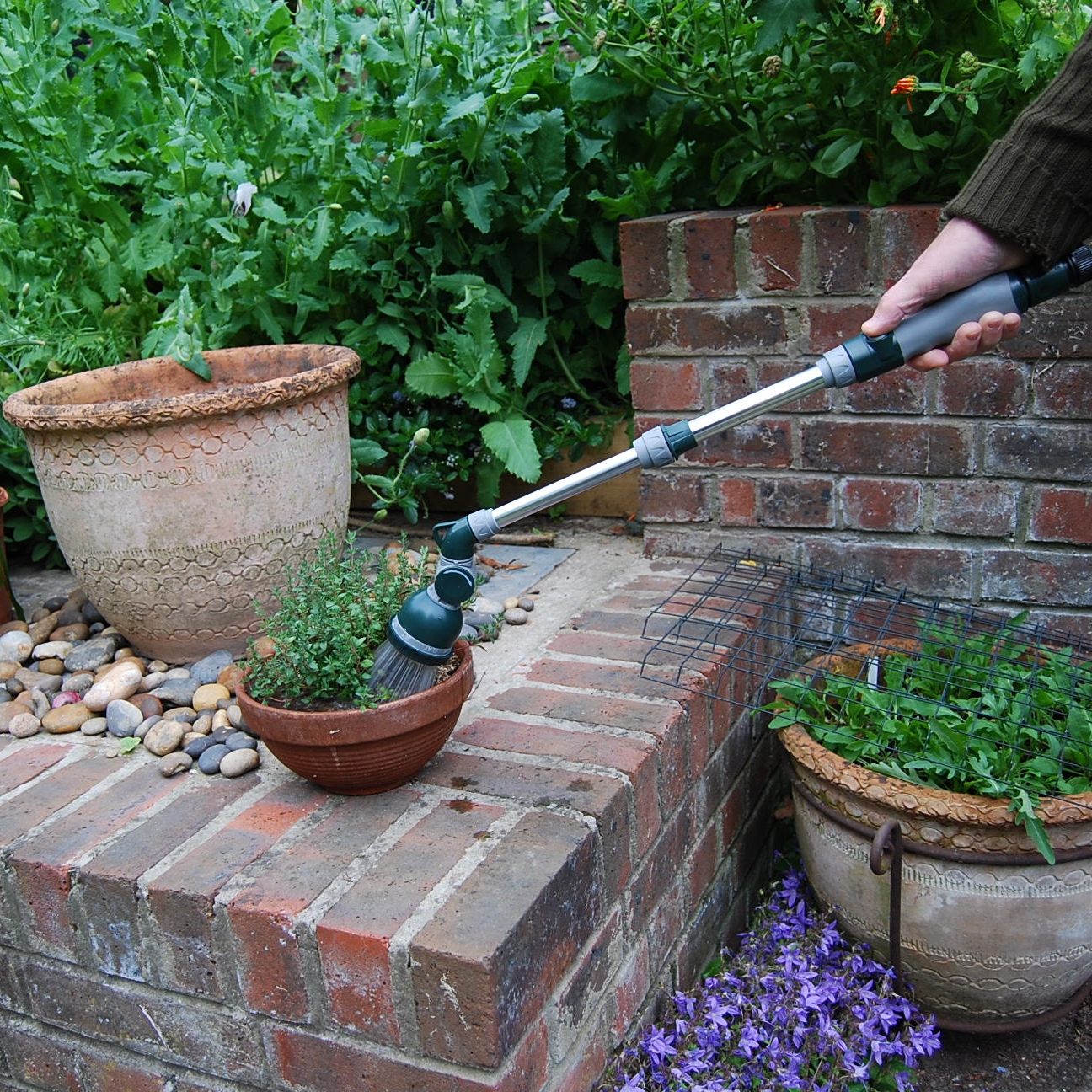 With a lance nozzle you can put water exactly where it's needed, without bending or stretching