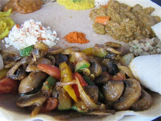 Vegetarians will find much to love about this restaurant, with an array of stewed lentil and cabbage dishes, and the romi pictured, a sauté of mushrooms and veggies.