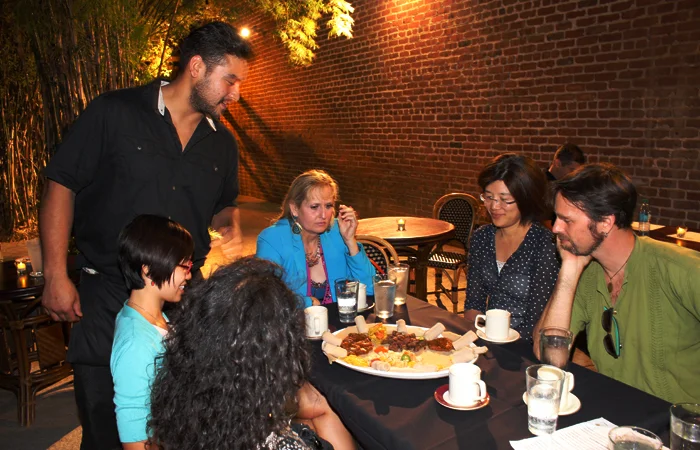 The service is friendly and explains what each dish is on your communal plate