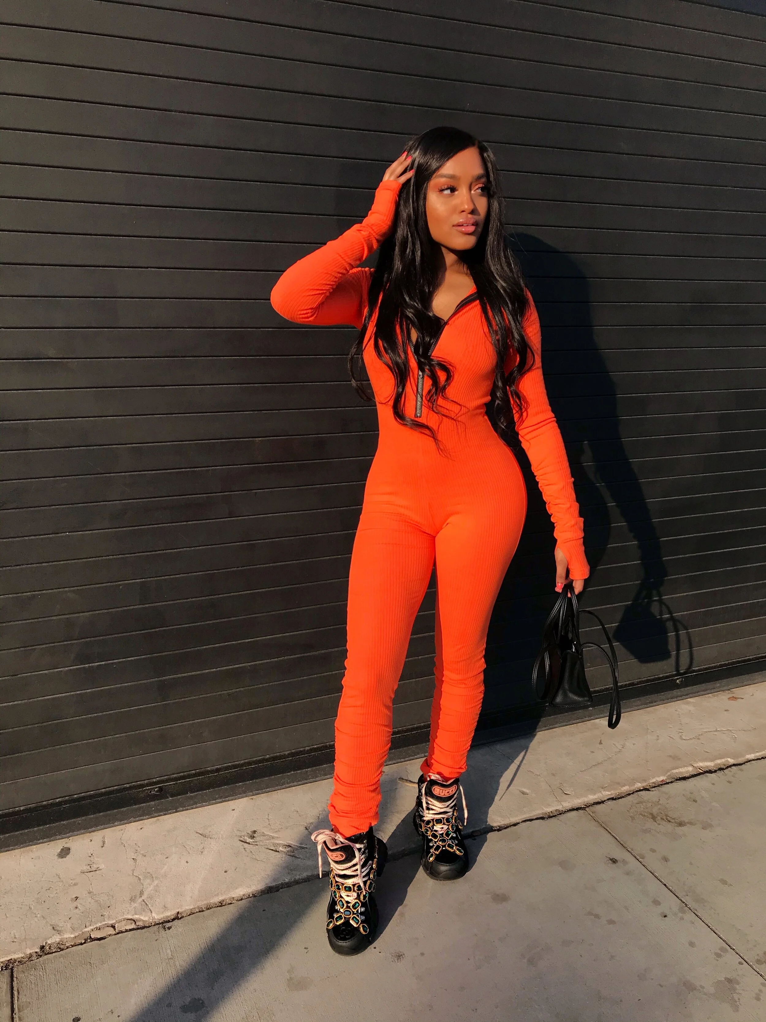 orange and pink jumpsuit