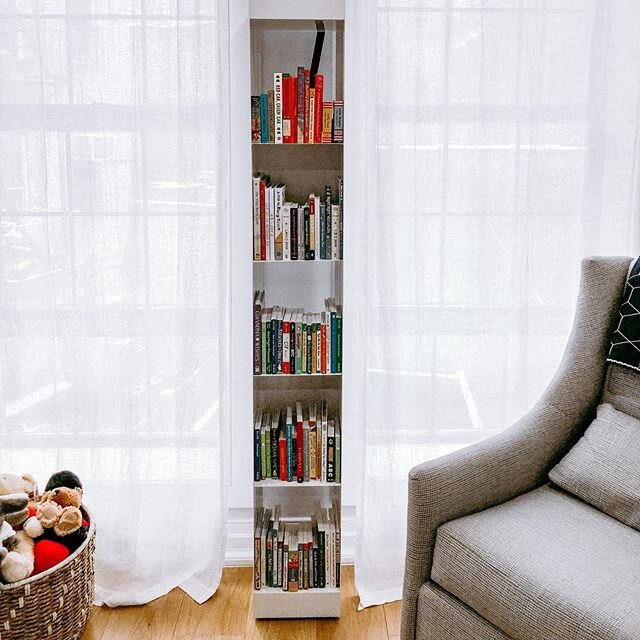This little nook is one of our favorites. It became a welcoming space that smartly utilized even the smallest strip of space between windows - city living at its best!